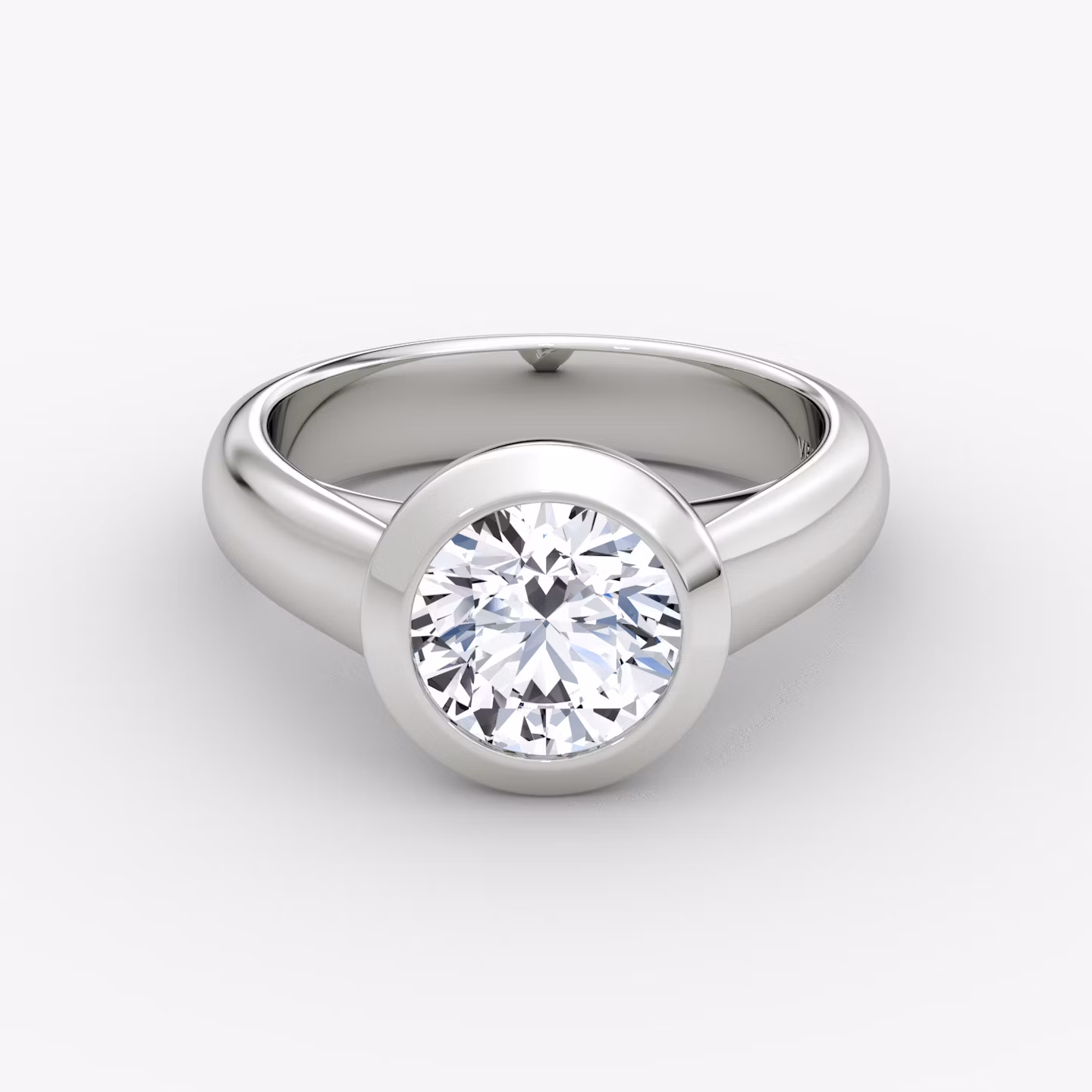 The Sculpture Bezel | Round Brilliant | Platinum | bandAccent: Plain | caratWeight: other | diamondOrientation: vertical
