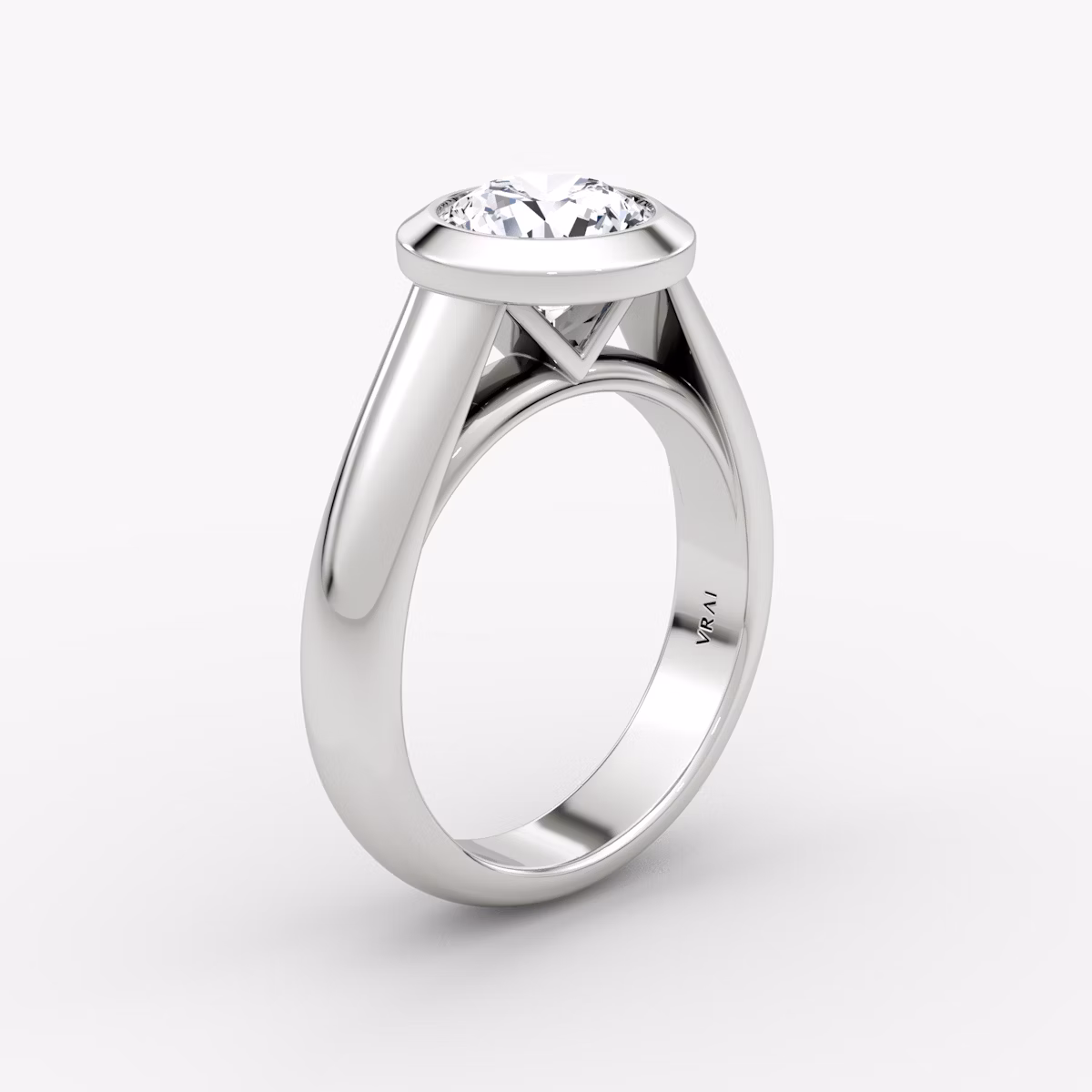 The Sculpture Bezel | Round Brilliant | 18k | White Gold | bandAccent: Plain | caratWeight: other | diamondOrientation: vertical