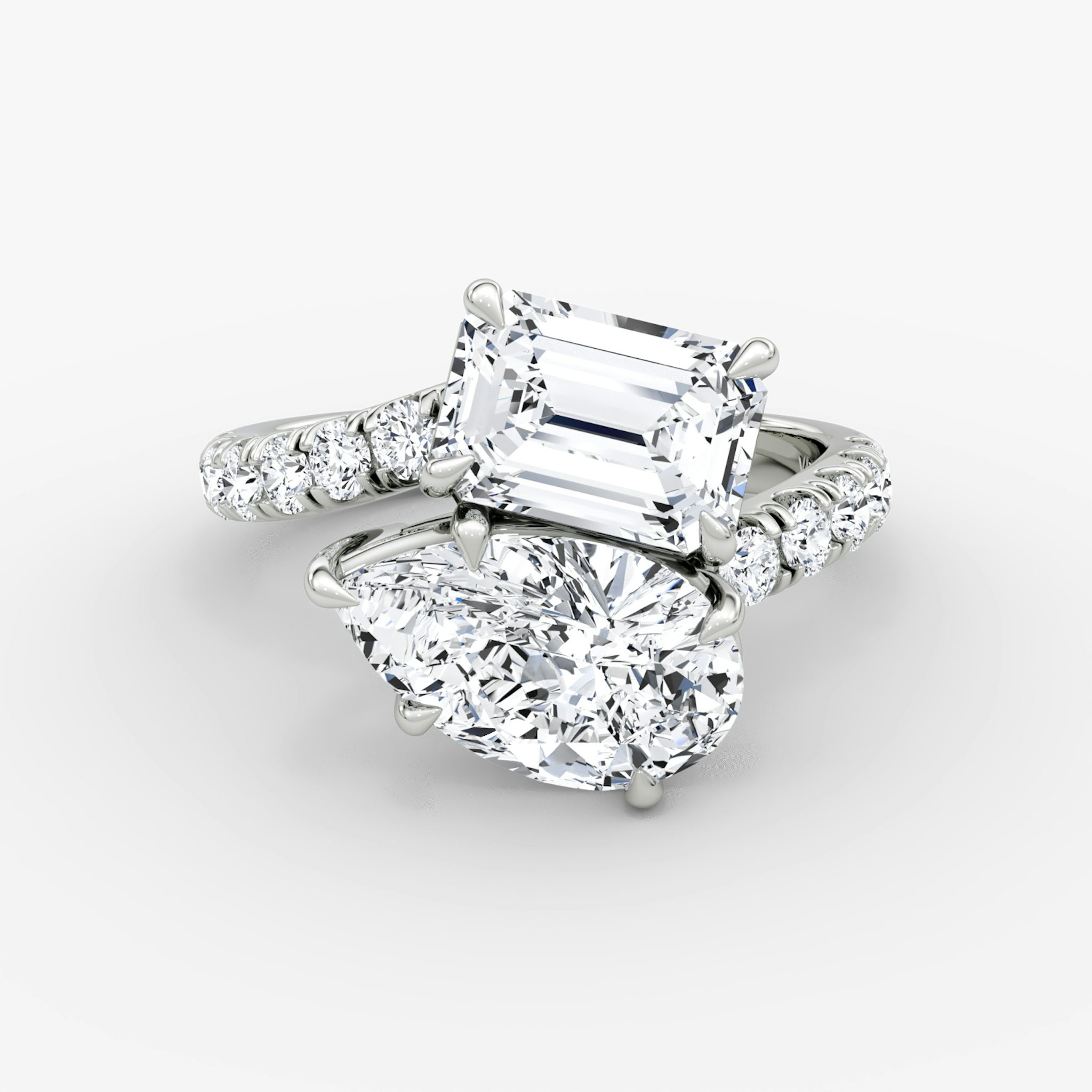 The Toi et Moi Bypass | Emerald and Pear | Platinum | bandAccent: Pavé | diamondOrientation: vertical | caratWeight: other