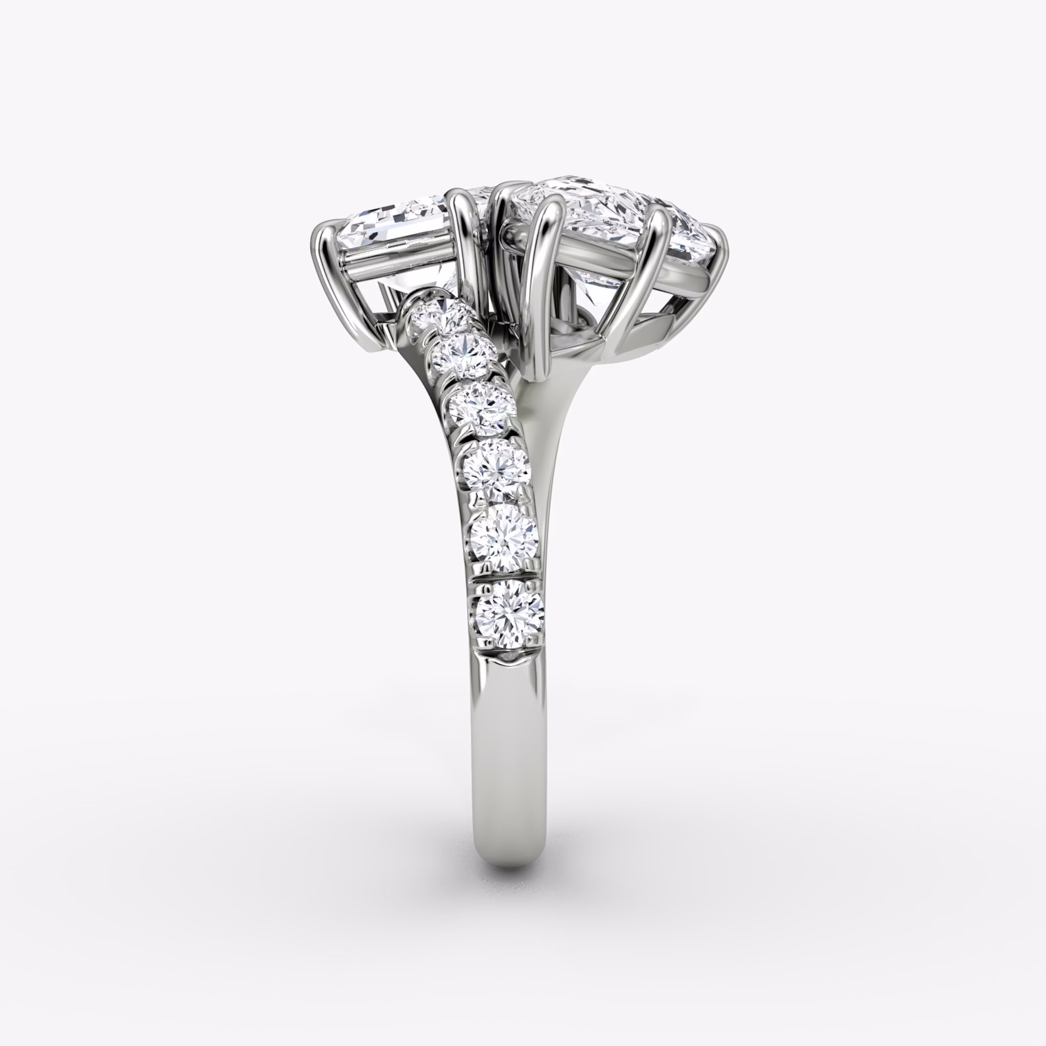 The Toi et Moi Bypass | Emerald and Pear | Platinum | bandAccent: Pavé | diamondOrientation: vertical | caratWeight: other