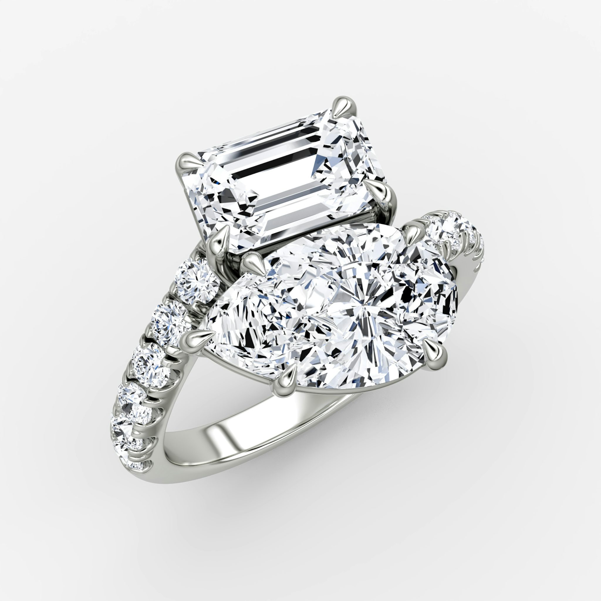 The Toi et Moi Bypass | Emerald and Pear | Platinum | bandAccent: Pavé | diamondOrientation: vertical | caratWeight: other