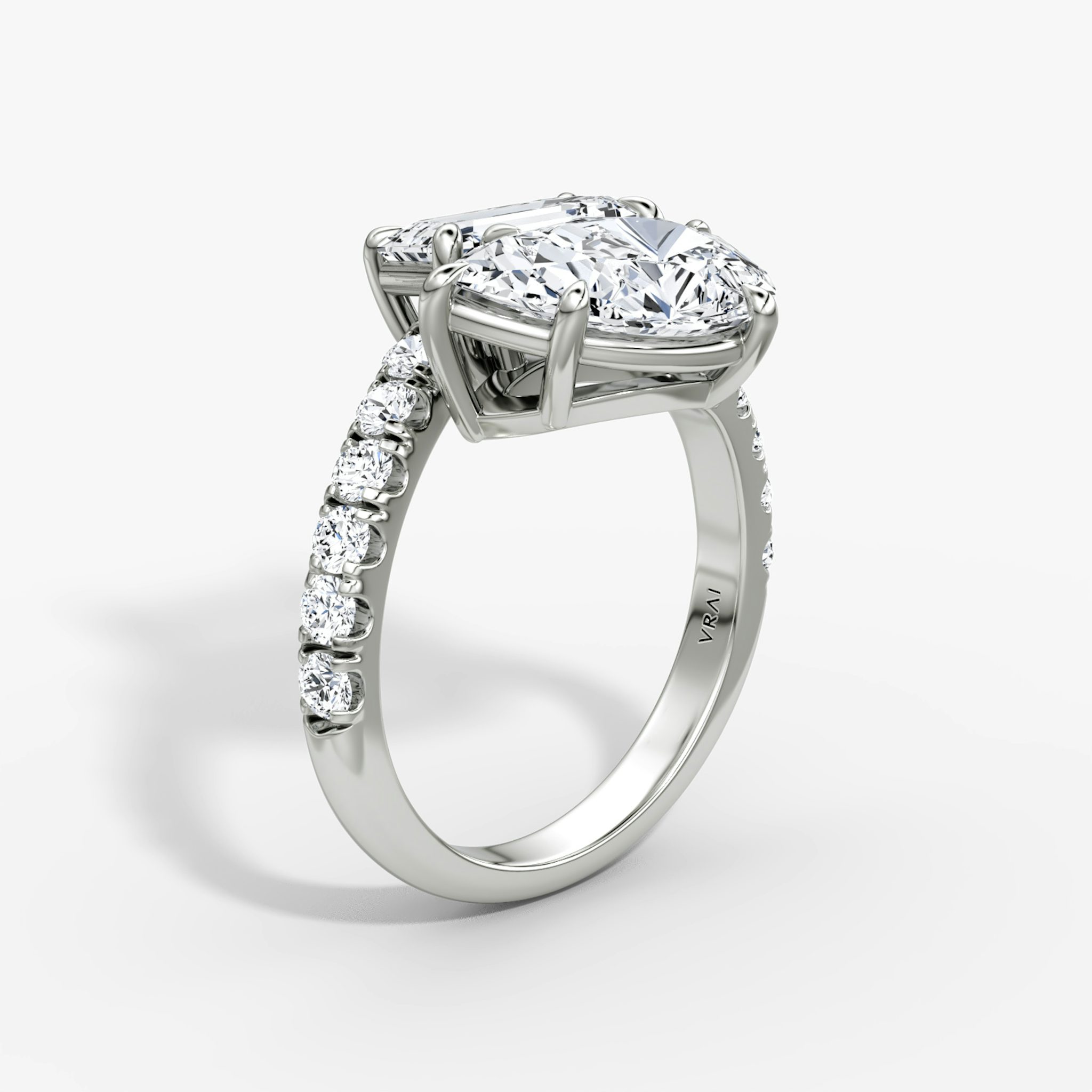 The Toi et Moi Bypass | Emerald and Pear | Platinum | bandAccent: Pavé | diamondOrientation: vertical | caratWeight: other
