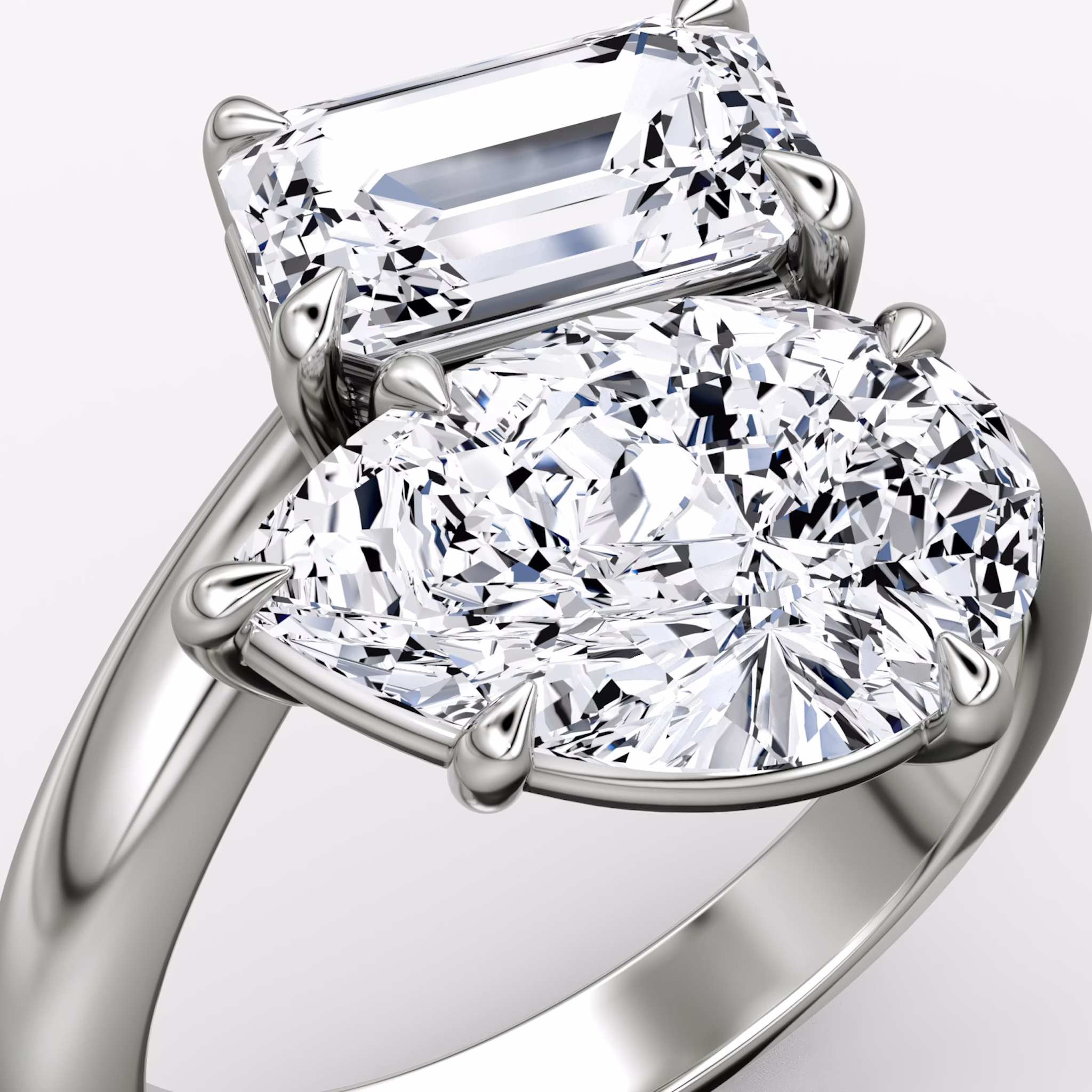 The Toi et Moi Bypass | Emerald and Pear | Platinum | bandAccent: Plain | diamondOrientation: vertical | caratWeight: other