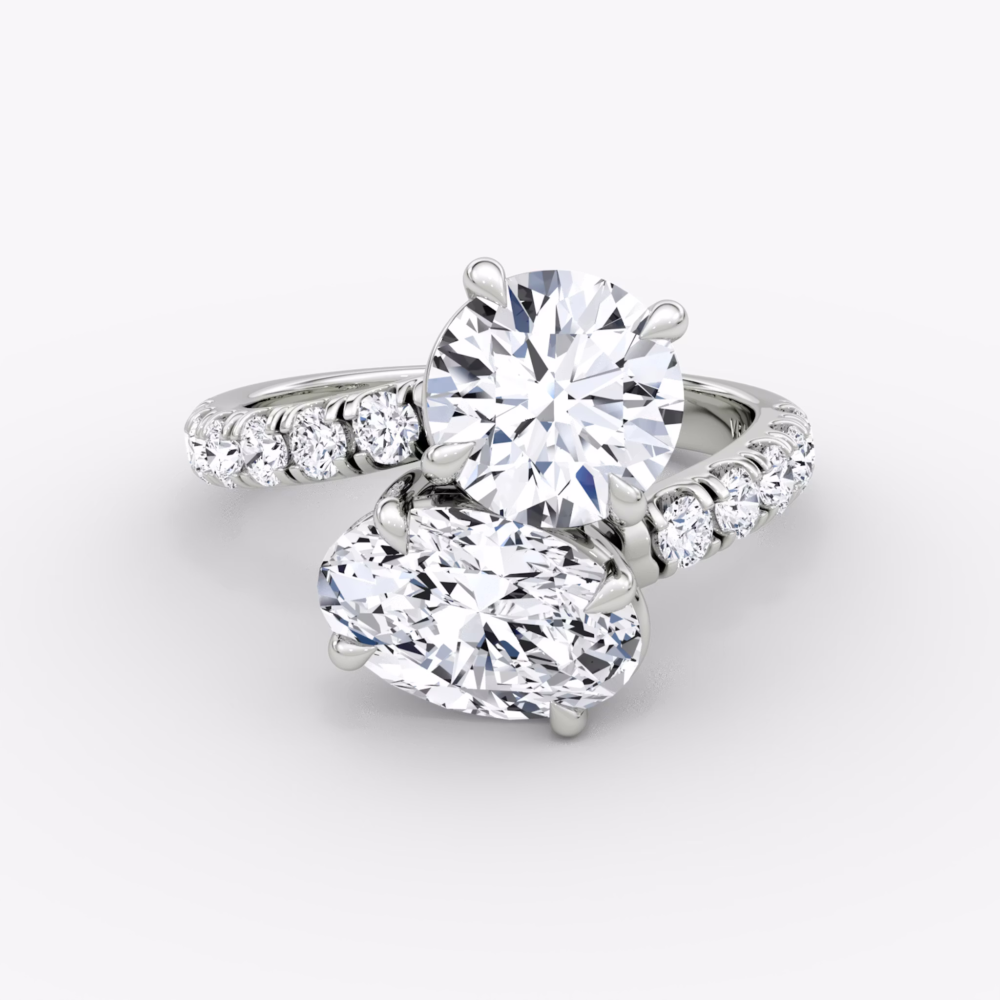 The Toi et Moi Bypass | Round Brilliant and Oval | Platinum | bandAccent: Pavé | diamondOrientation: vertical | caratWeight: other