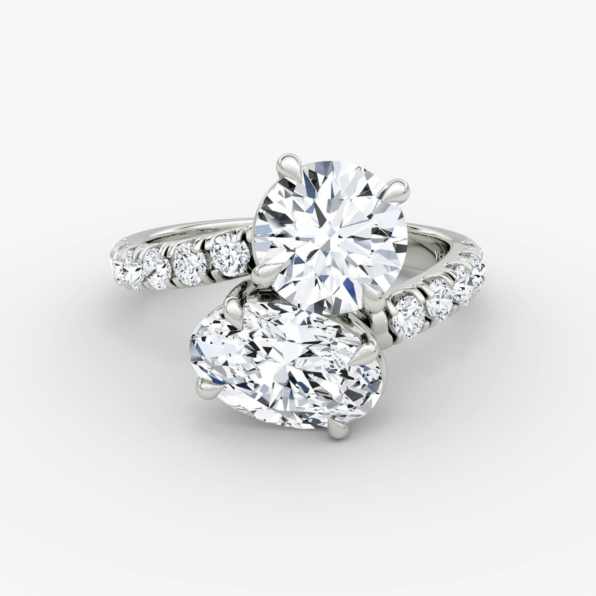 The Toi et Moi Bypass | Round Brilliant and Oval | Platinum | bandAccent: Pavé | diamondOrientation: vertical | caratWeight: other