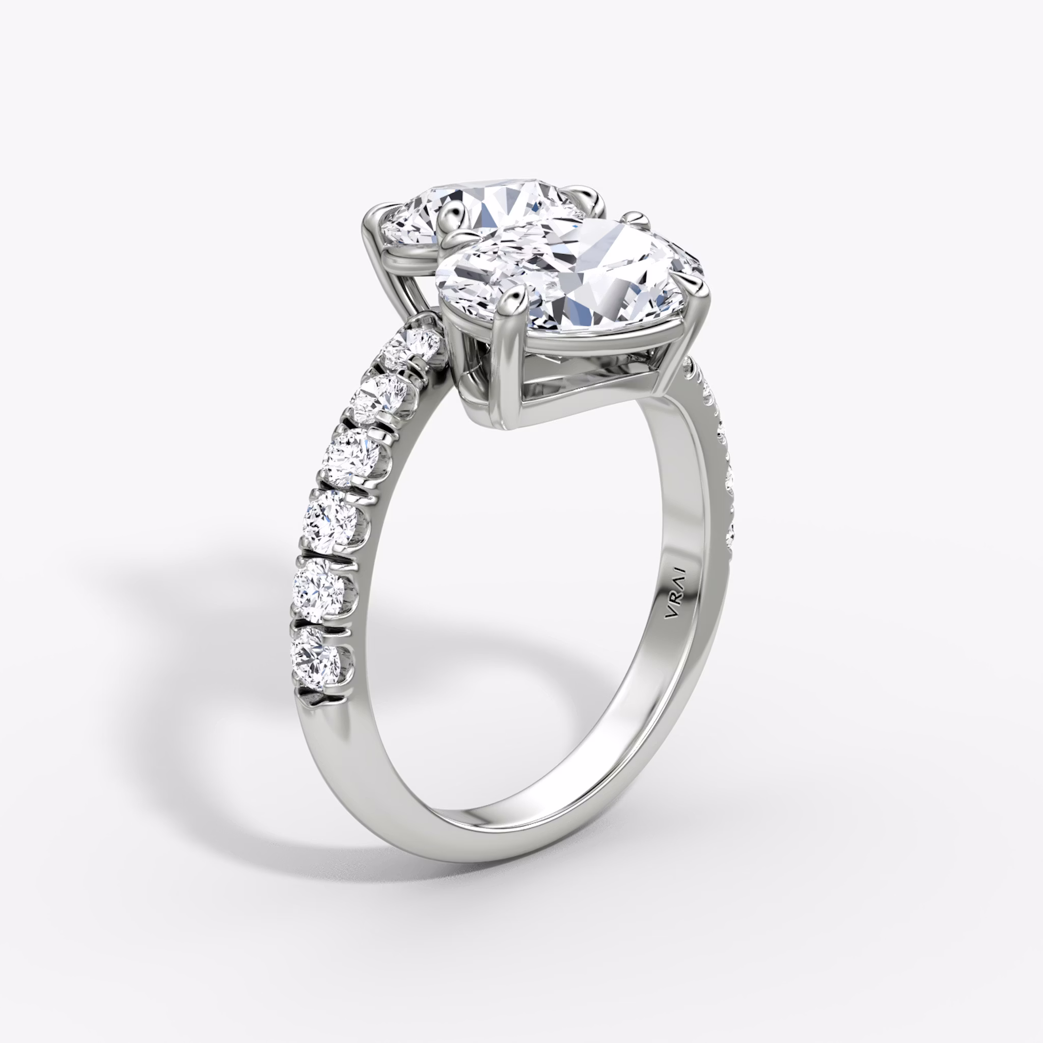 The Toi et Moi Bypass | Round Brilliant and Oval | Platinum | bandAccent: Pavé | diamondOrientation: vertical | caratWeight: other