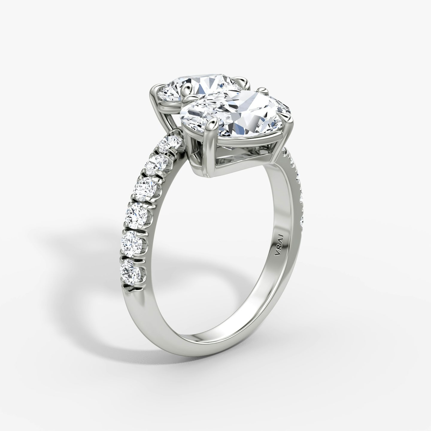 The Toi et Moi Bypass | Round Brilliant and Oval | 18k | White Gold | bandAccent: Pavé | diamondOrientation: vertical | caratWeight: other