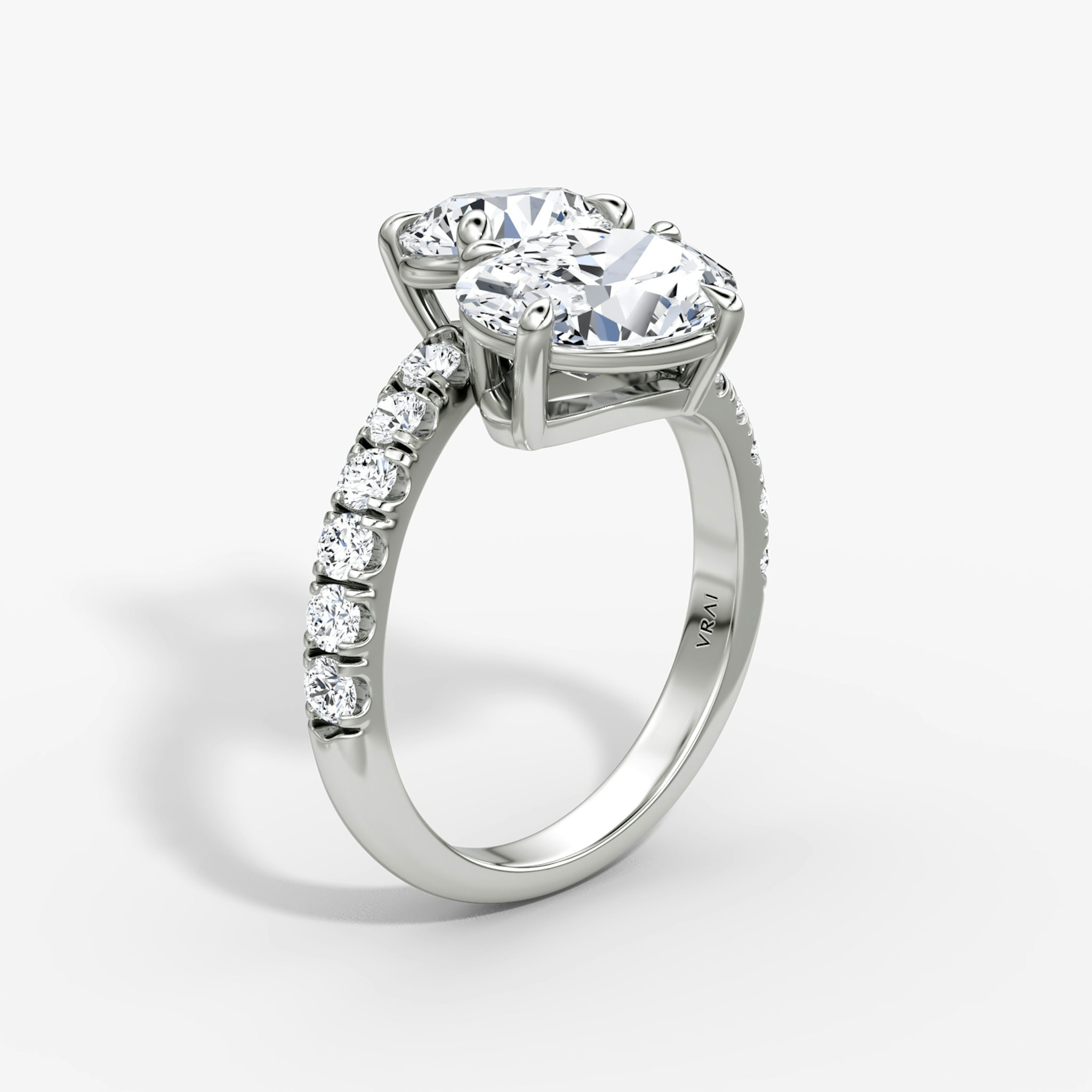 The Toi et Moi Bypass | Round Brilliant and Oval | Platinum | bandAccent: Pavé | diamondOrientation: vertical | caratWeight: other