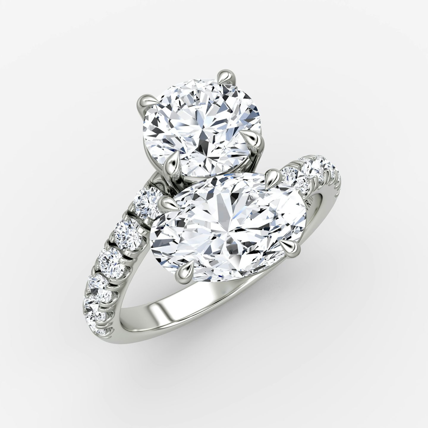 The Toi et Moi Bypass | Round Brilliant and Oval | 18k | White Gold | bandAccent: Pavé | diamondOrientation: vertical | caratWeight: other