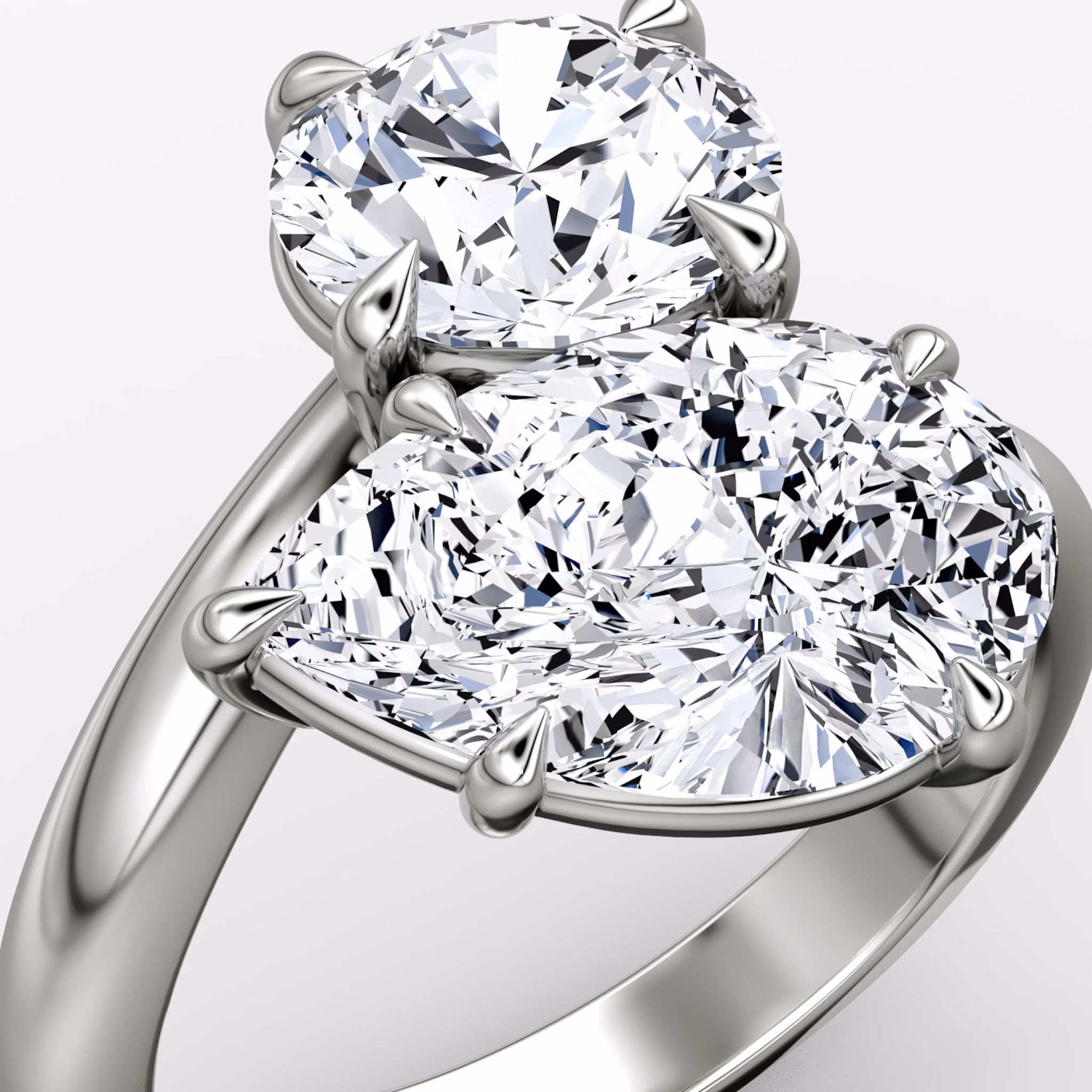 The Toi et Moi Bypass | Round Brilliant and Pear | Platinum | bandAccent: Plain | diamondOrientation: vertical | caratWeight: other