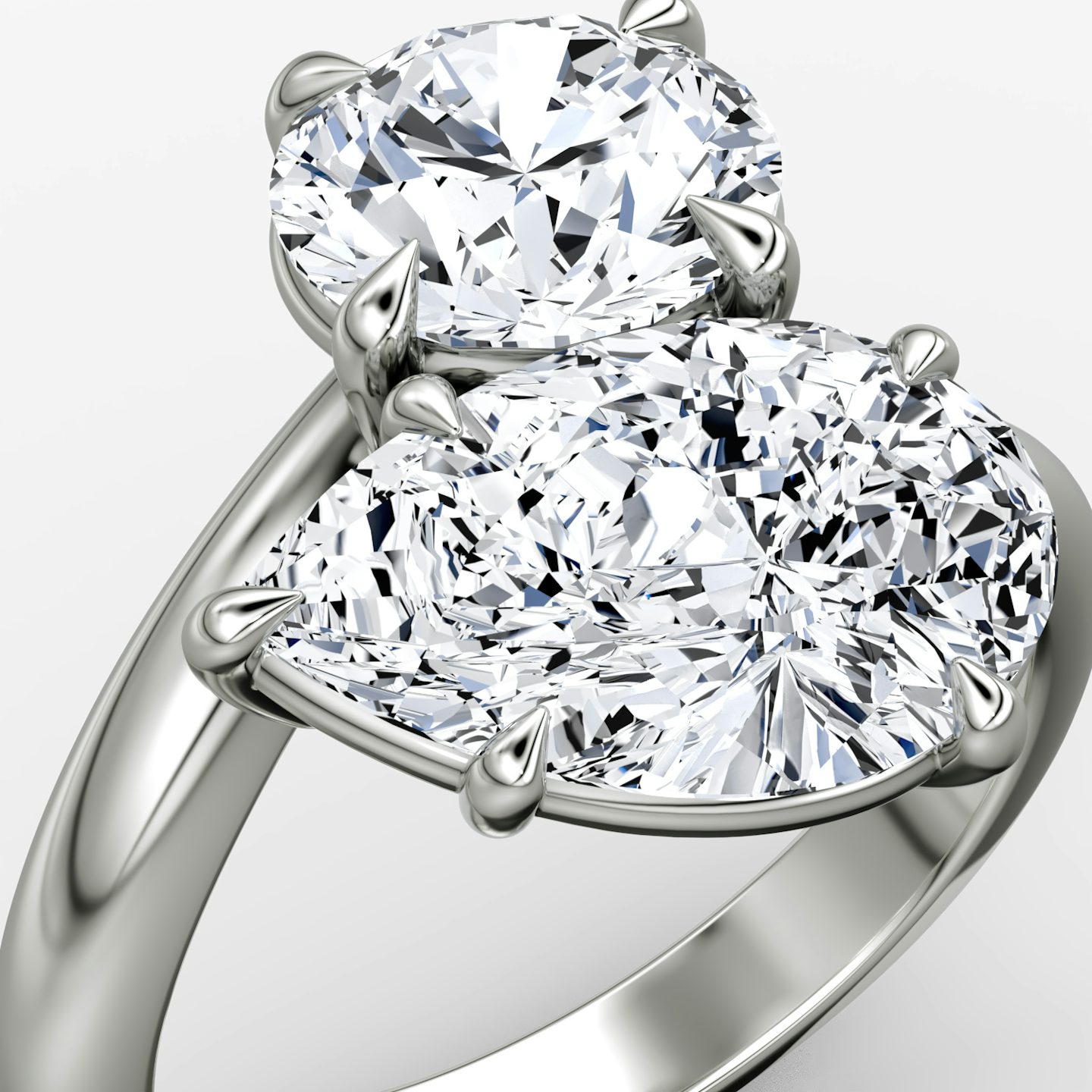 The Toi et Moi Bypass | Round Brilliant and Pear | Platinum | bandAccent: Plain | diamondOrientation: vertical | caratWeight: other