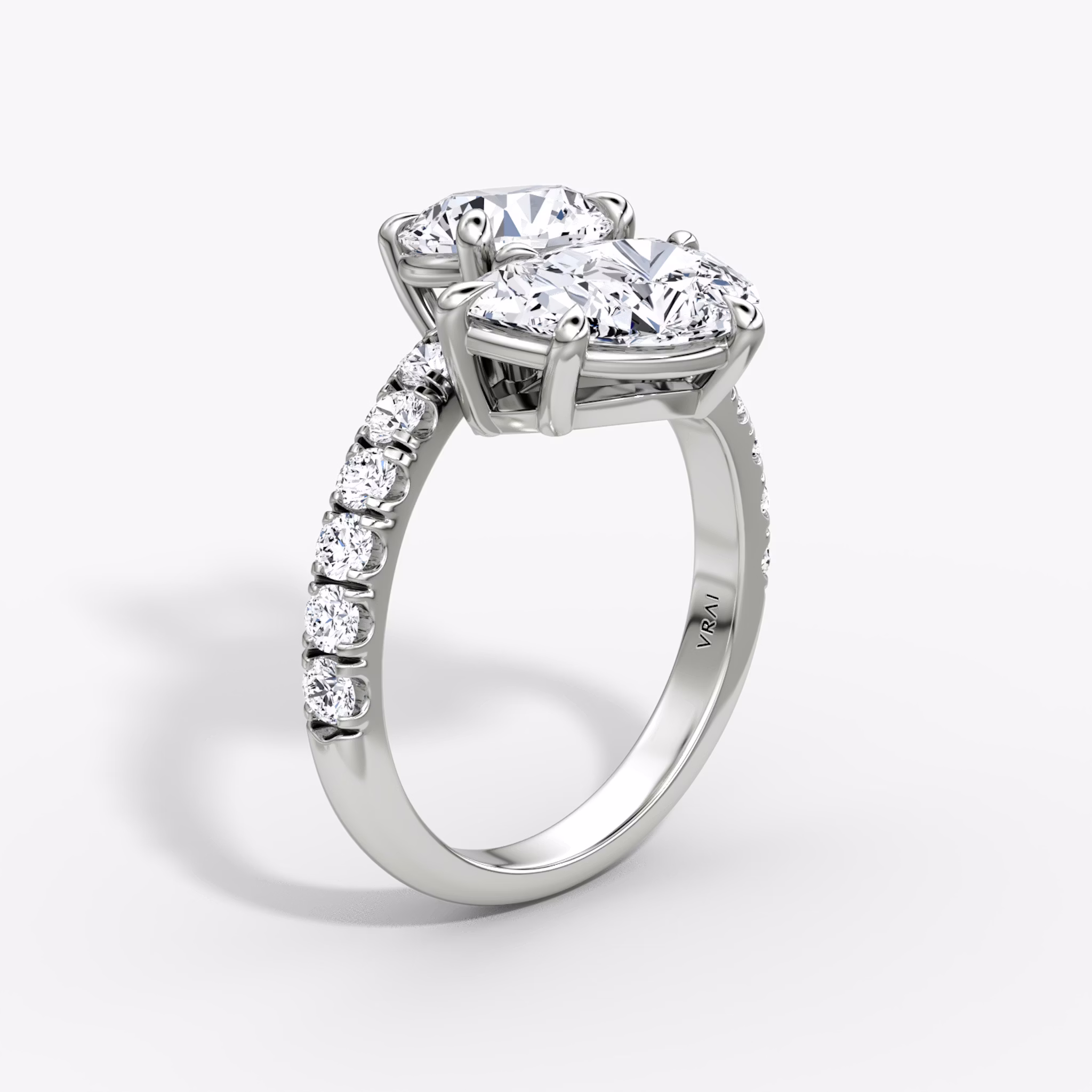 The Toi et Moi Bypass | Round Brilliant and Pear | Platinum | bandAccent: Pavé | diamondOrientation: vertical | caratWeight: other