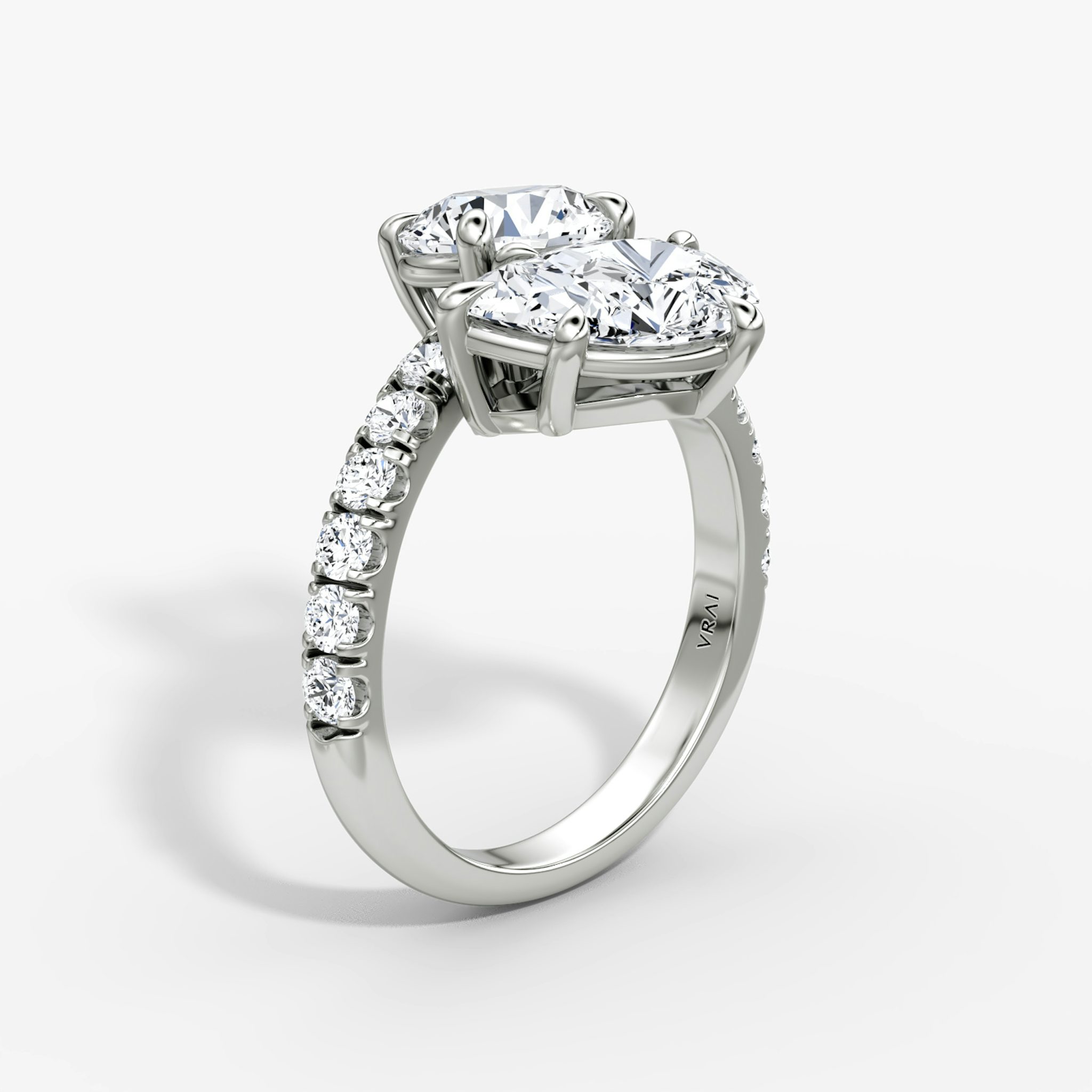 The Toi et Moi Bypass | Round Brilliant and Pear | Platinum | bandAccent: Pavé | diamondOrientation: vertical | caratWeight: other