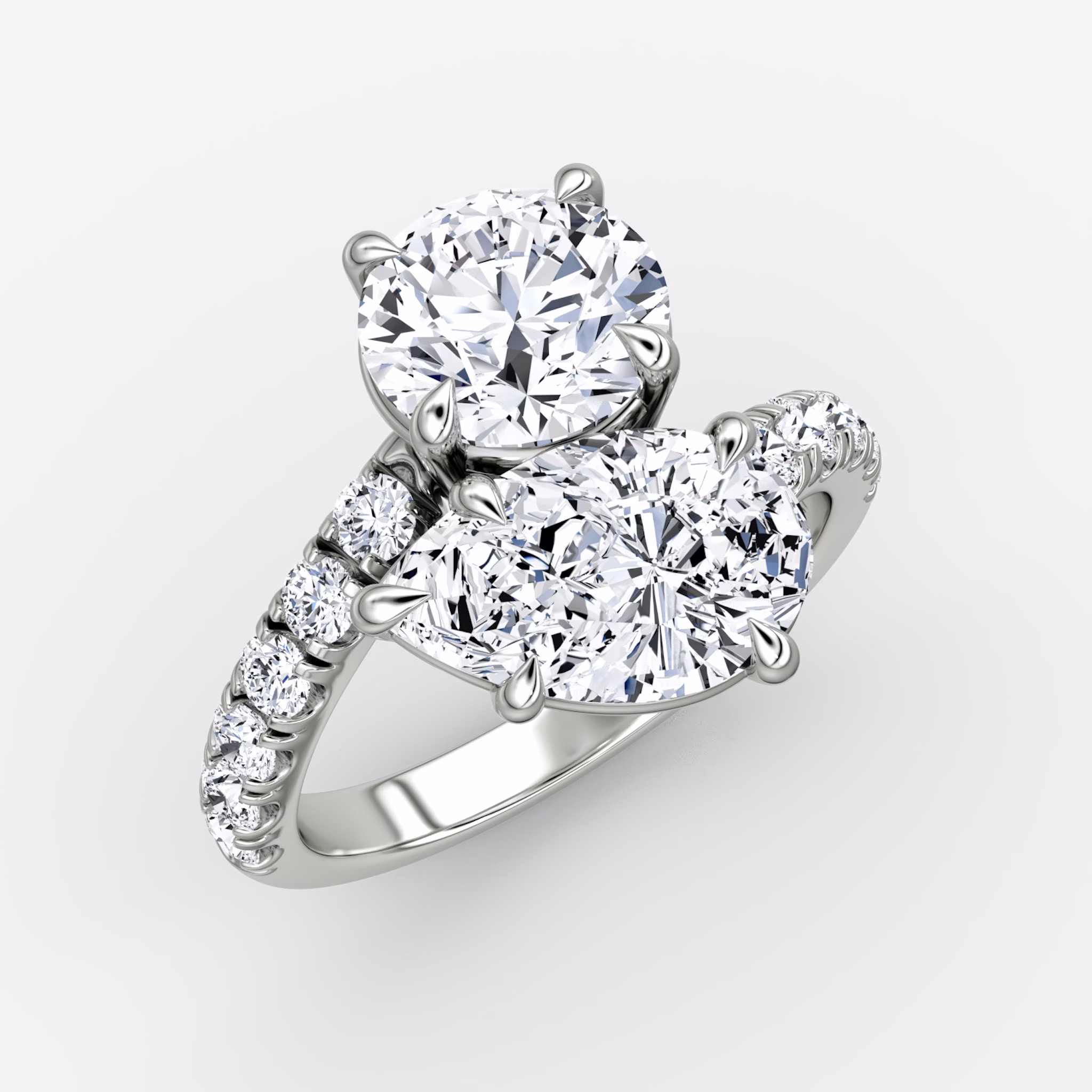 The Toi et Moi Bypass | Round Brilliant and Pear | Platinum | bandAccent: Pavé | diamondOrientation: vertical | caratWeight: other