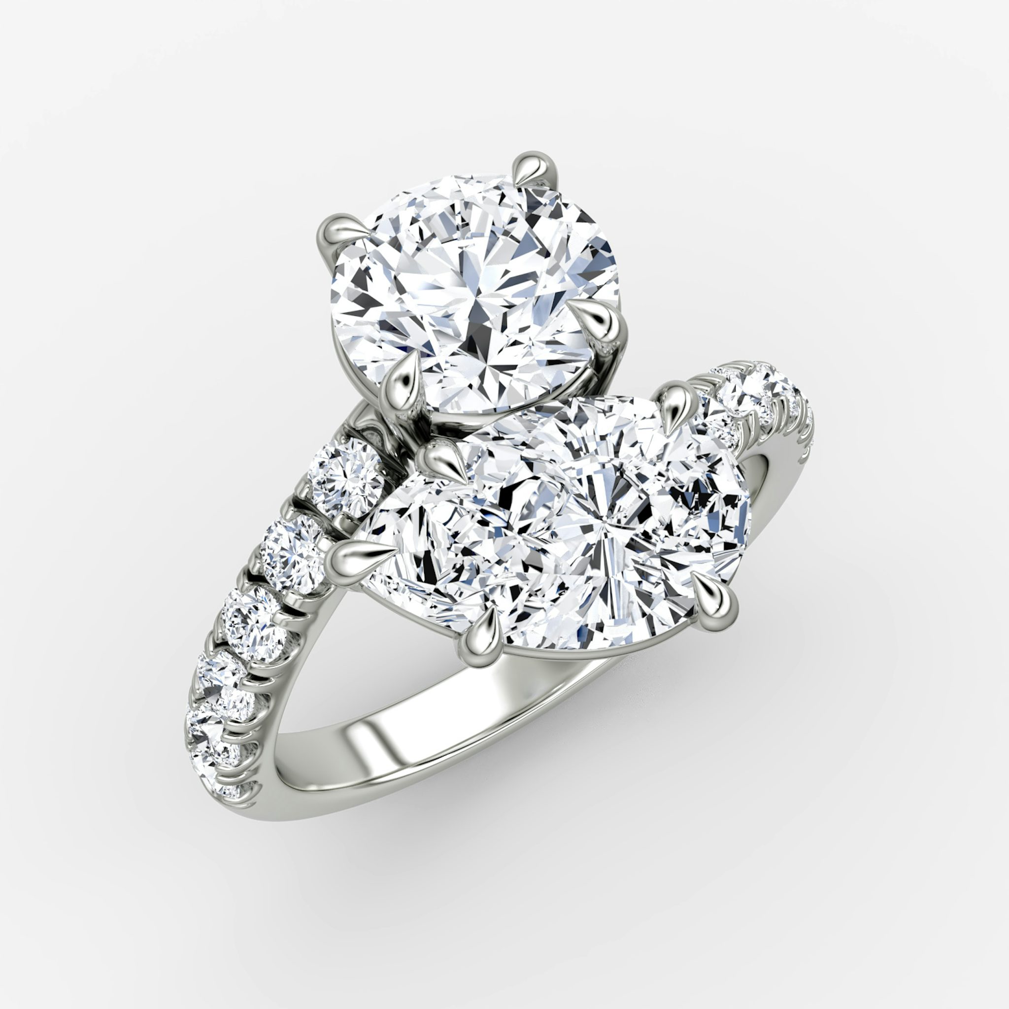 The Toi et Moi Bypass | Round Brilliant and Pear | Platinum | bandAccent: Pavé | diamondOrientation: vertical | caratWeight: other