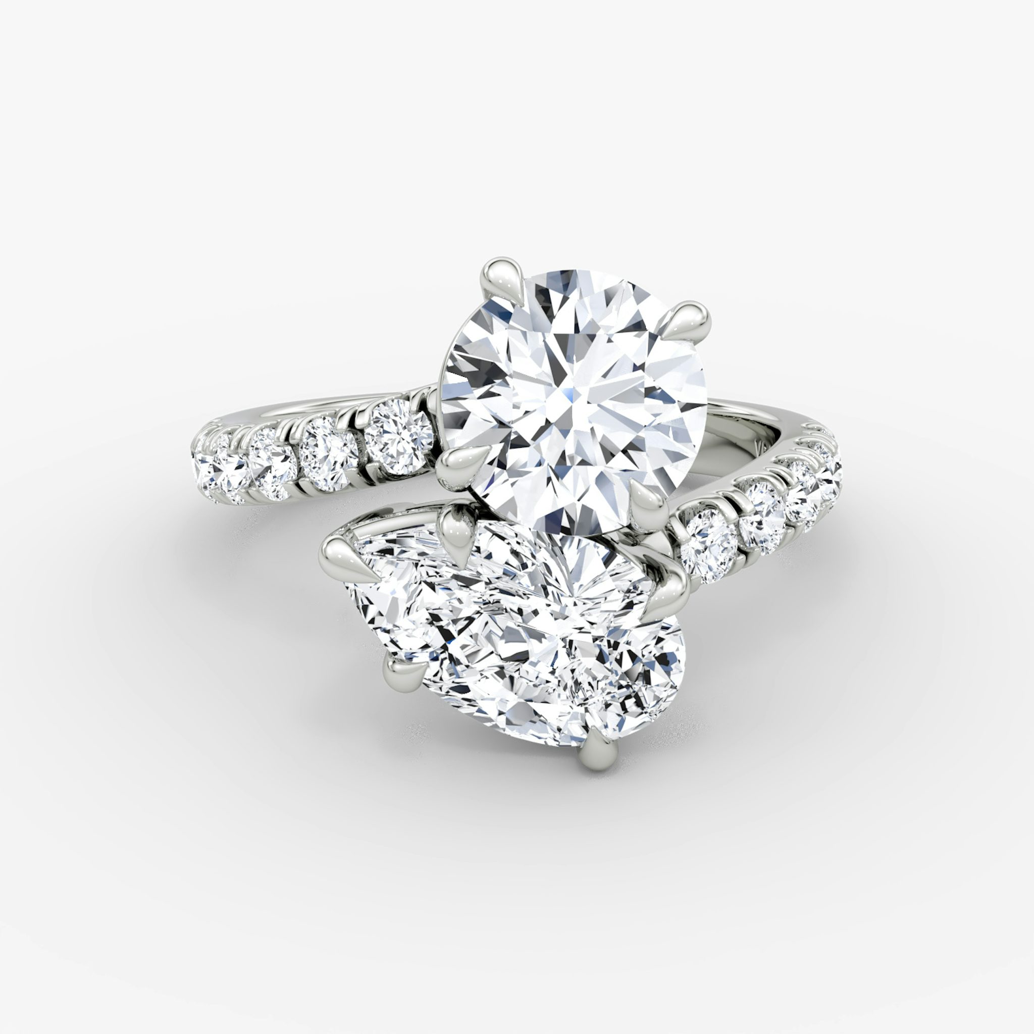 The Toi et Moi Bypass | Round Brilliant and Pear | Platinum | bandAccent: Pavé | diamondOrientation: vertical | caratWeight: other