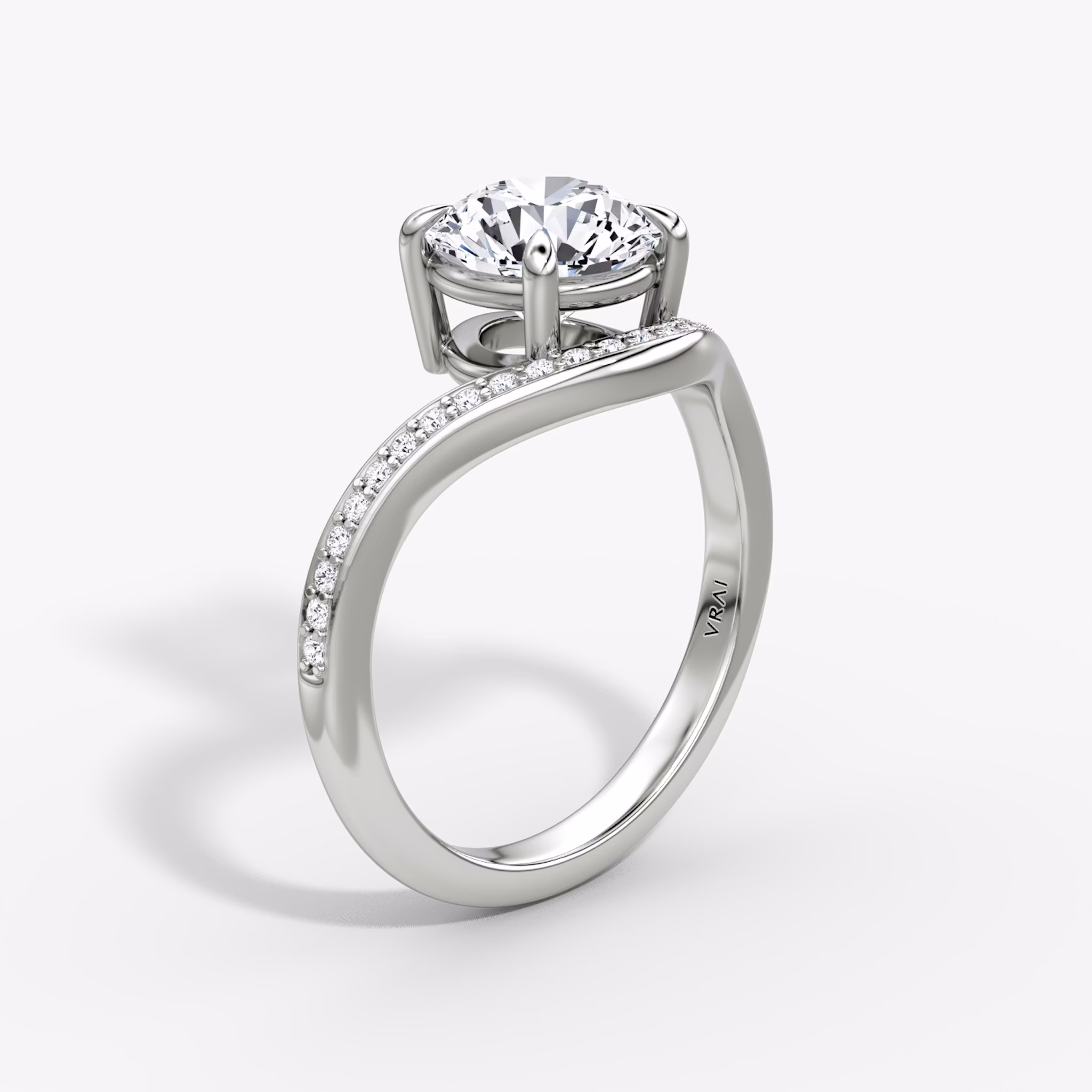 The Curve | Round Brilliant | Platinum | bandAccent: Pavé | caratWeight: 1.5ct | diamondOrientation: vertical