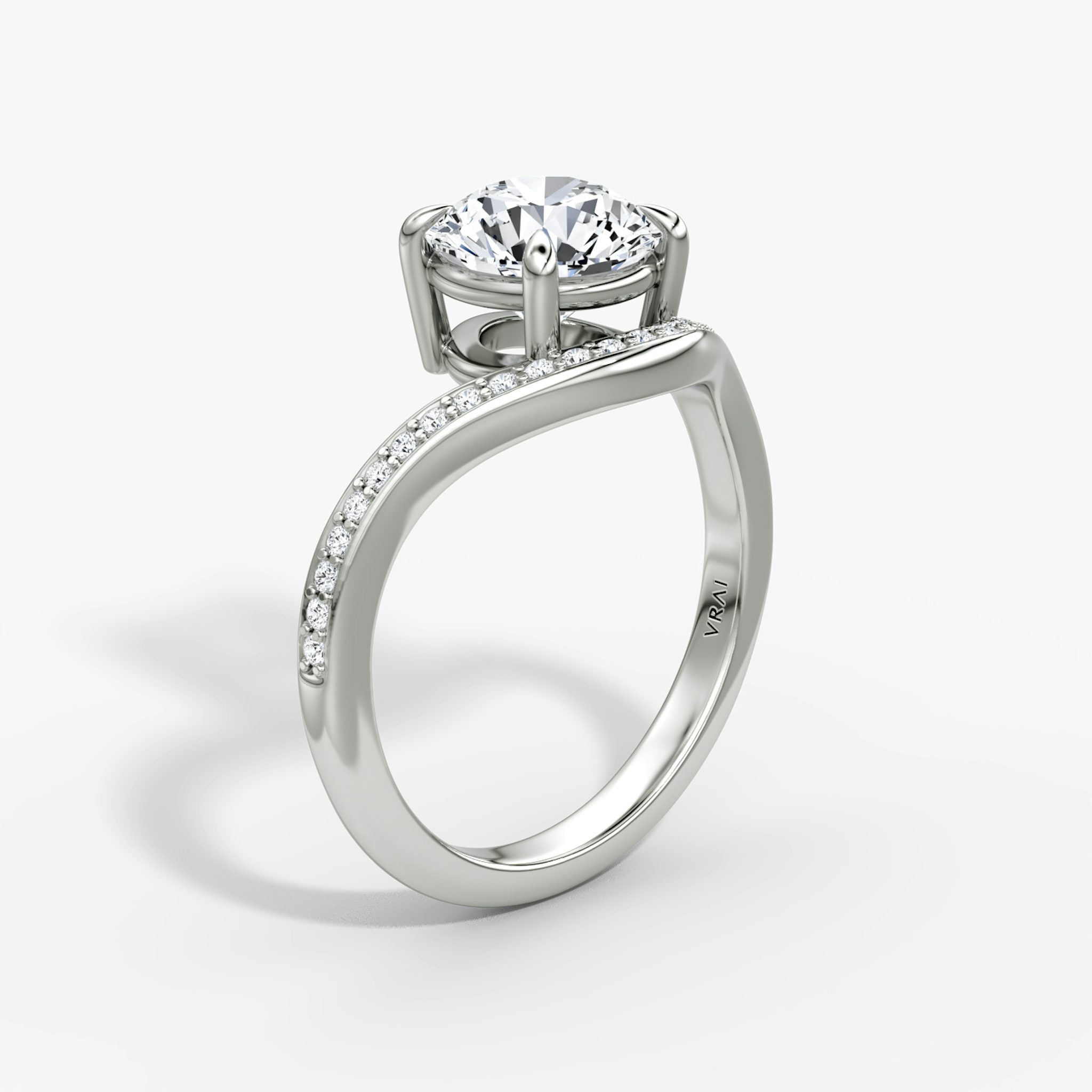 The Curve | Round Brilliant | Platinum | bandAccent: Pavé | caratWeight: 1.0ct | diamondOrientation: vertical