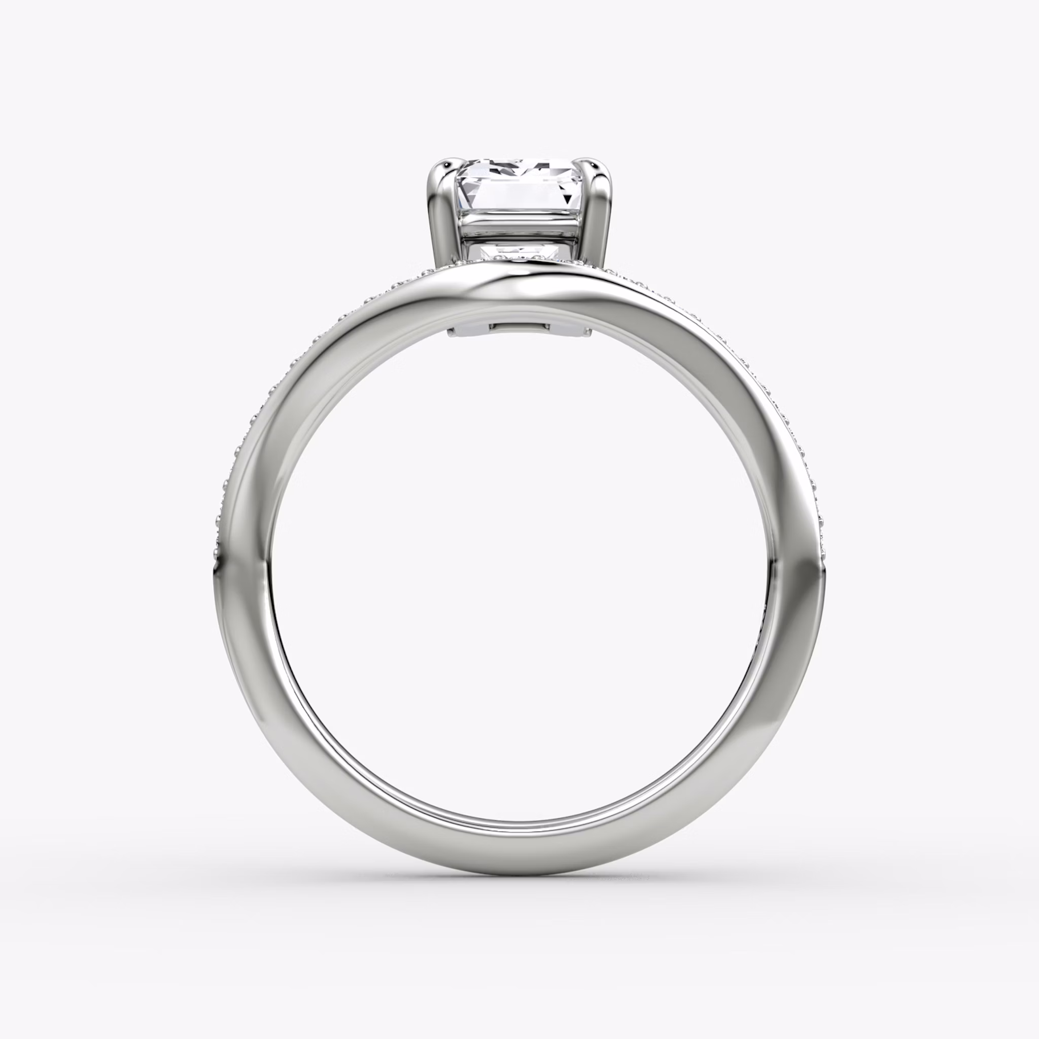 The Curve | Emerald | Platinum | bandAccent: Pavé | diamondOrientation: vertical | caratWeight: other