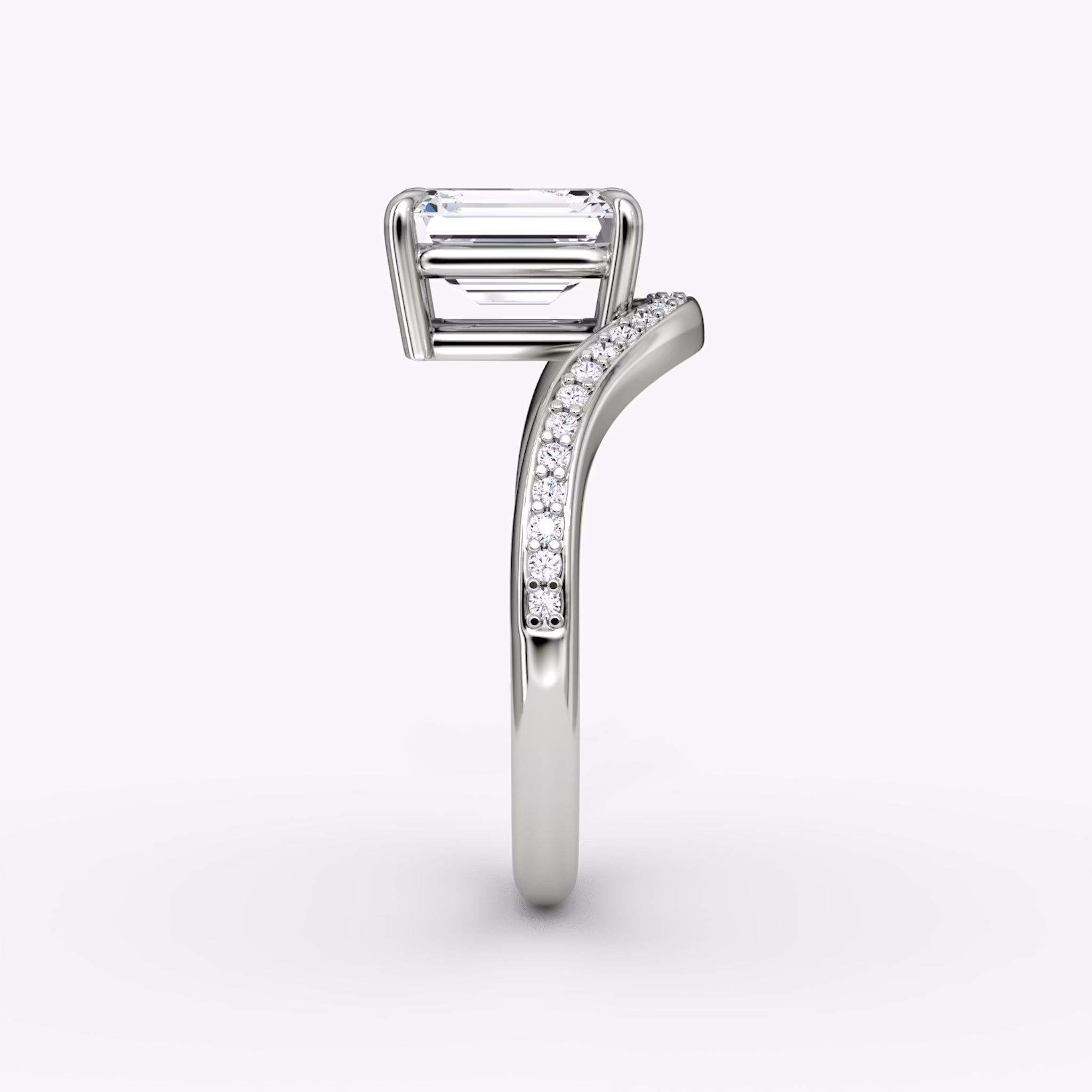 The Curve | Emerald | Platinum | bandAccent: Pavé | diamondOrientation: vertical | caratWeight: other