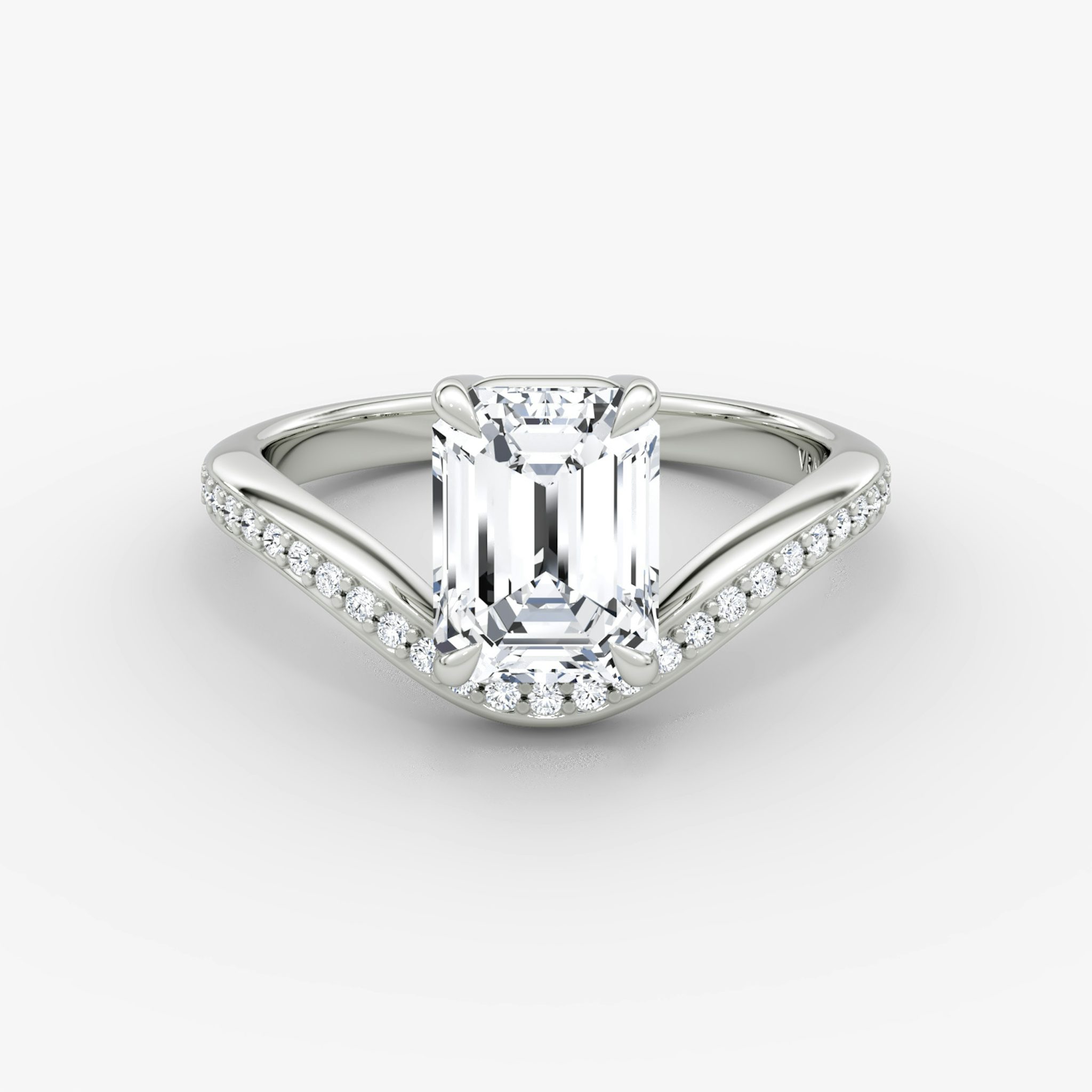 The Curve | Emerald | Platinum | bandAccent: Pavé | diamondOrientation: vertical | caratWeight: other