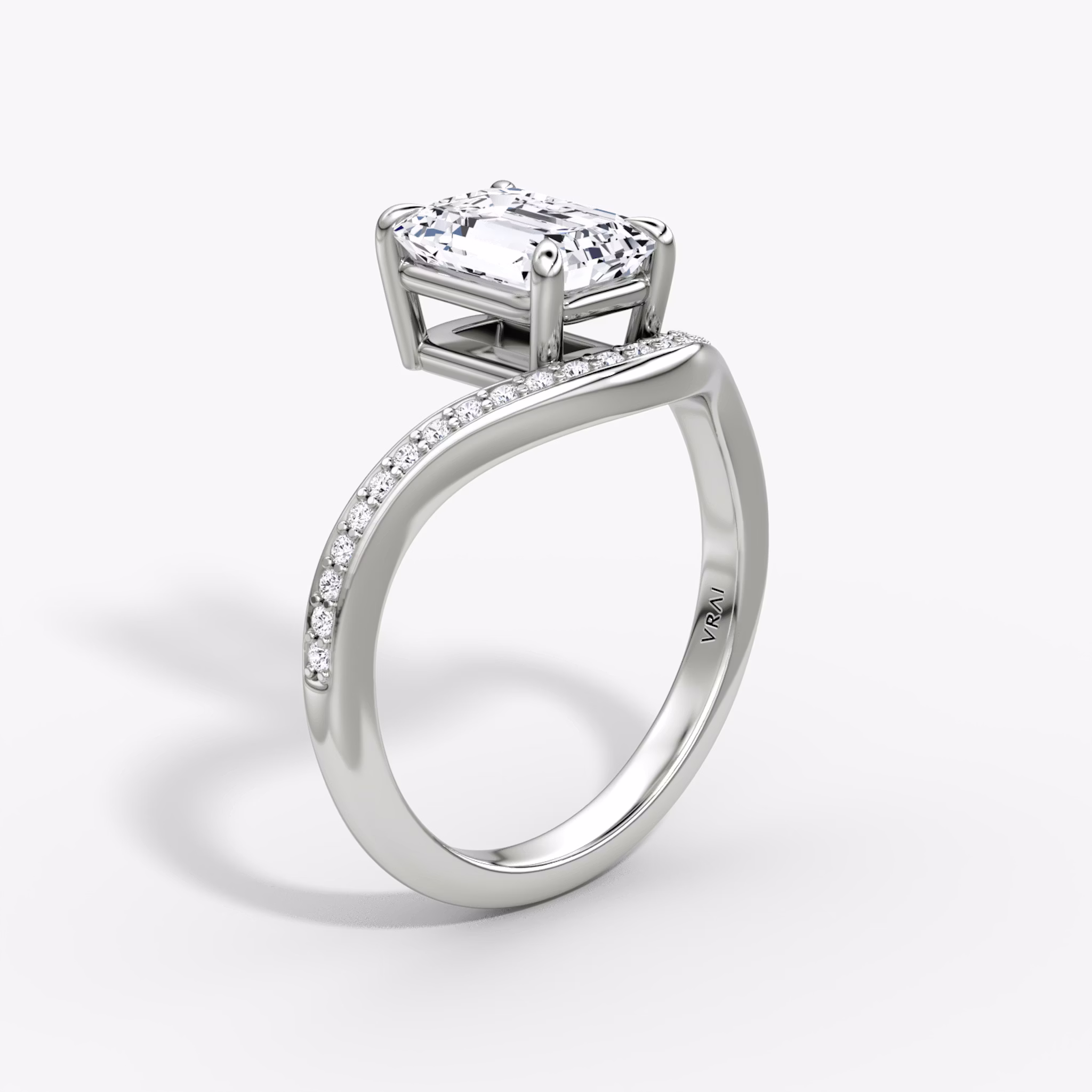 The Curve | Emerald | 18k | White Gold | bandAccent: Pavé | diamondOrientation: vertical | caratWeight: other