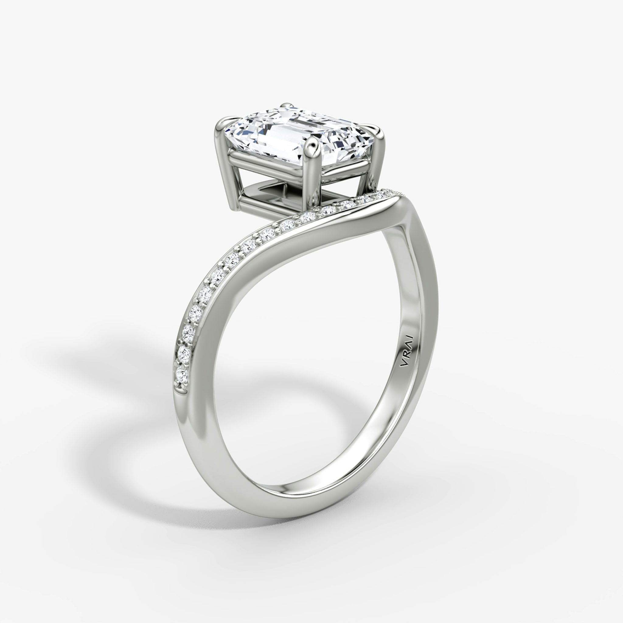 The Curve | Emerald | 18k | White Gold | bandAccent: Pavé | diamondOrientation: vertical | caratWeight: other