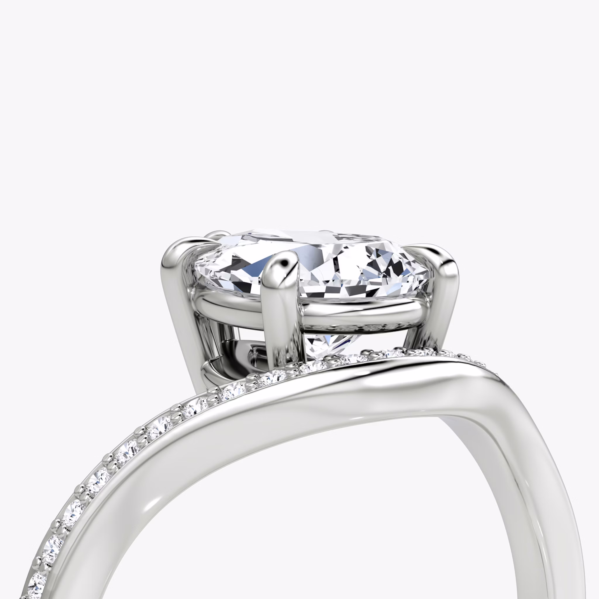 The Curve | Pear | Platinum | bandAccent: Pavé | diamondOrientation: vertical | caratWeight: other