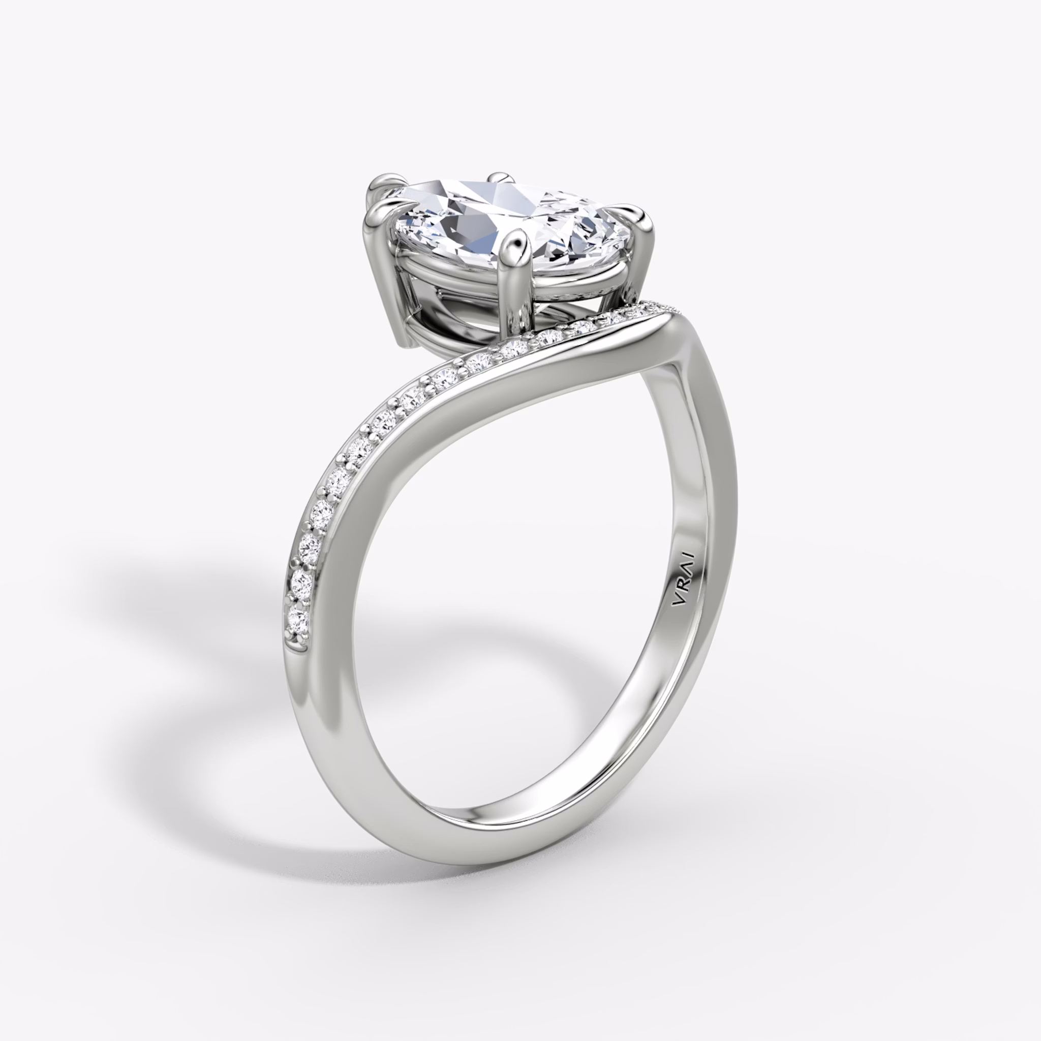 The Curve | Pear | Platinum | bandAccent: Pavé | diamondOrientation: vertical | caratWeight: other