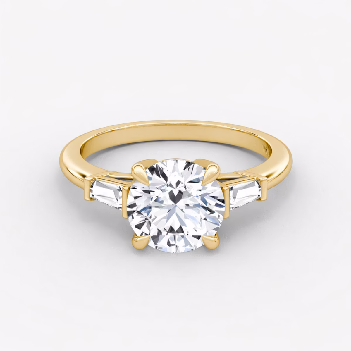 The Tapered Baguette Three Stone | Round Brilliant | 18k | Yellow Gold | bandAccent: Plain | caratWeight: other | excludeFromFeed: null | diamondOrientation: vertical
