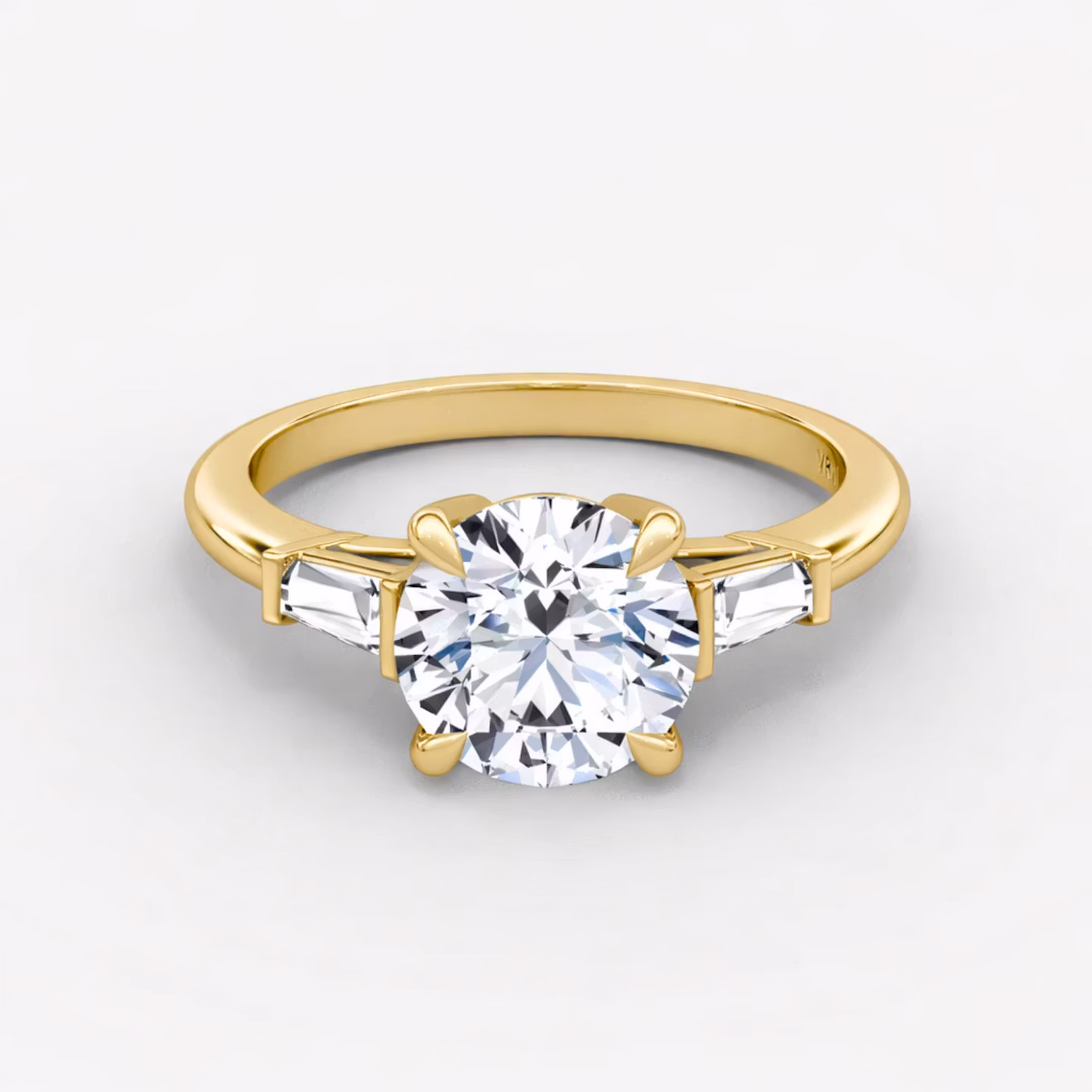 The Tapered Baguette Three Stone Round Brilliant | Yellow Gold