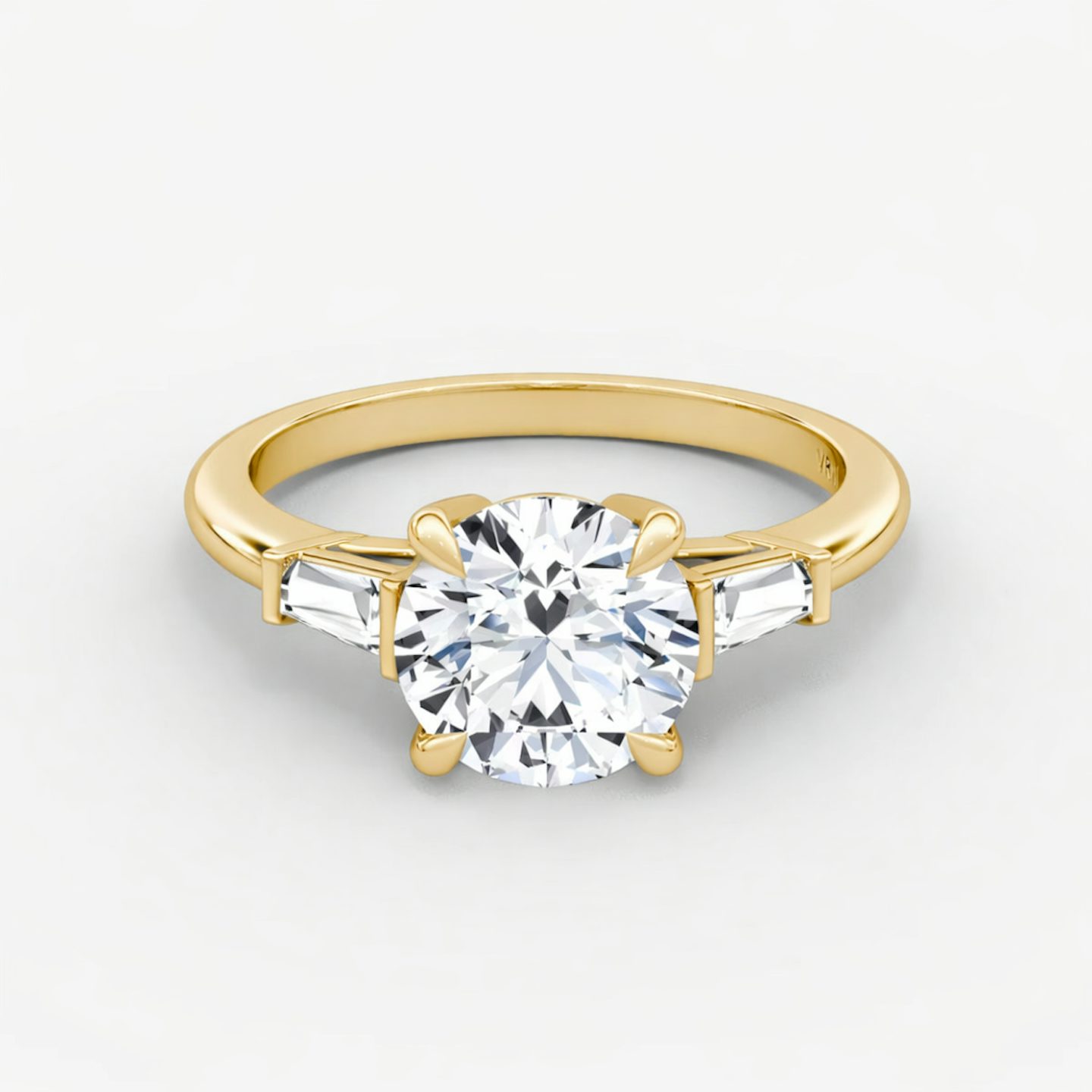 The Tapered Baguette Three Stone | Round Brilliant | 18k | Yellow Gold | bandAccent: Plain | caratWeight: other | excludeFromFeed: null | diamondOrientation: vertical