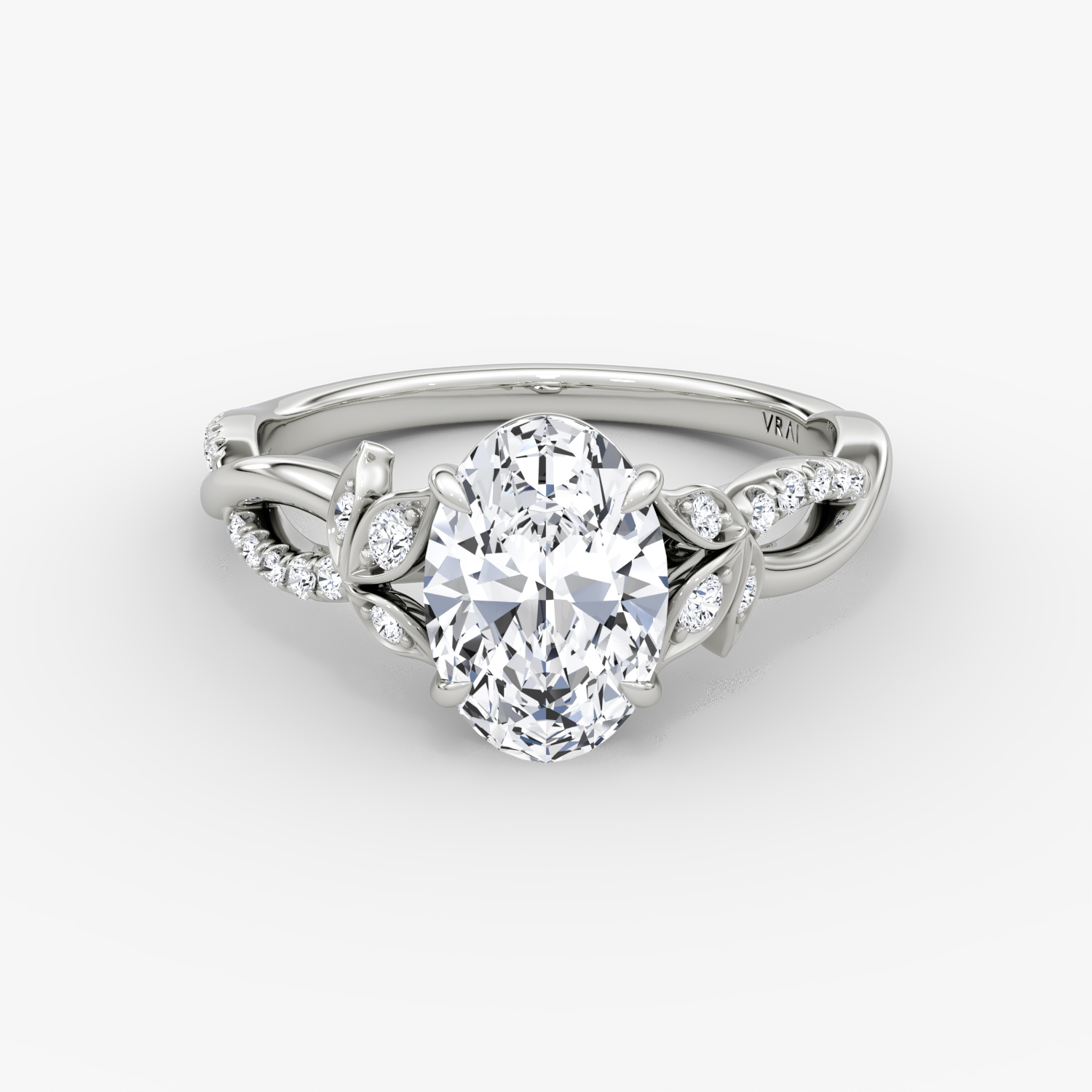 The Twisted Floral | Oval | Platinum | bandAccent: Pavé | diamondOrientation: vertical | caratWeight: other