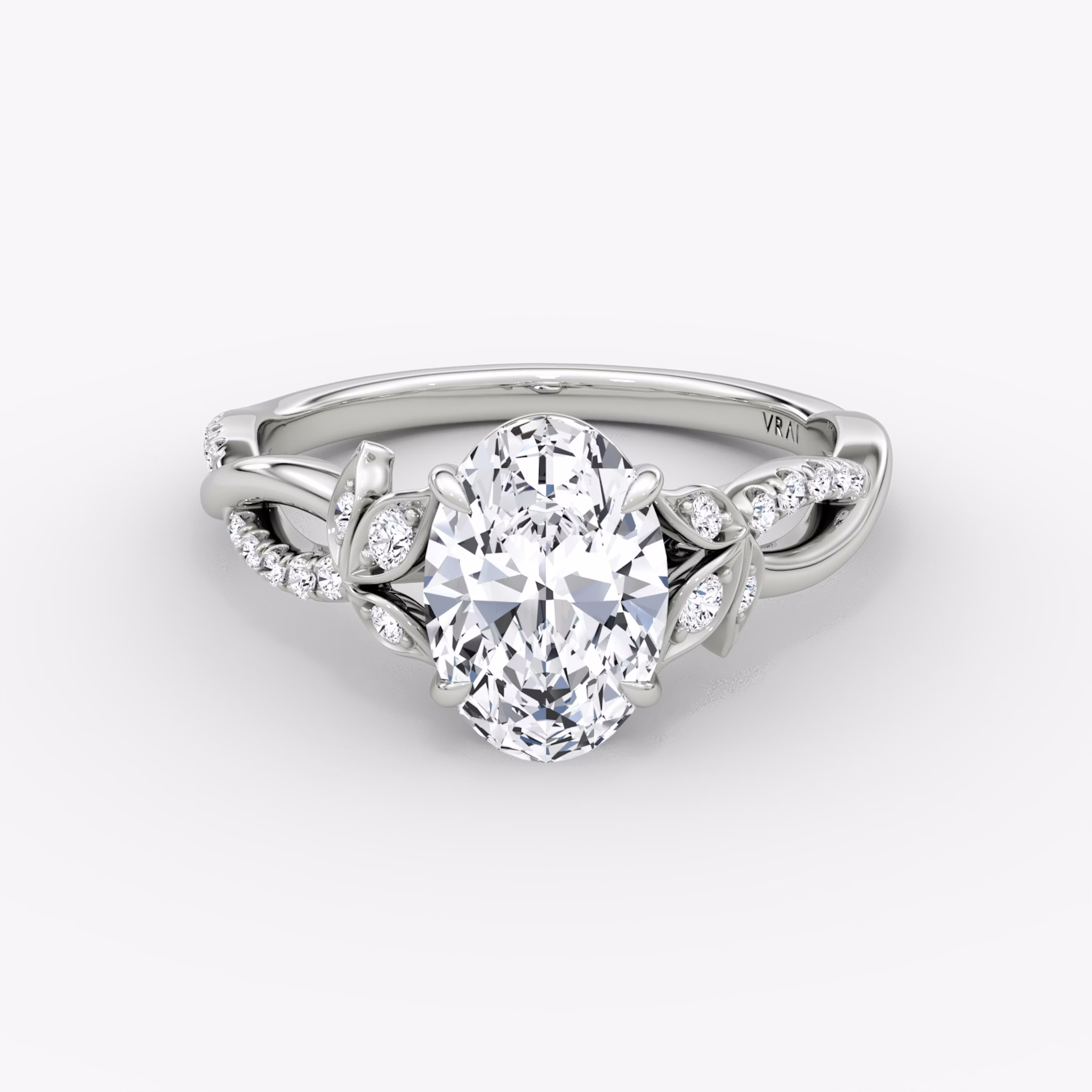 The Twisted Floral | Oval | Platinum | bandAccent: Pavé | diamondOrientation: vertical | caratWeight: other