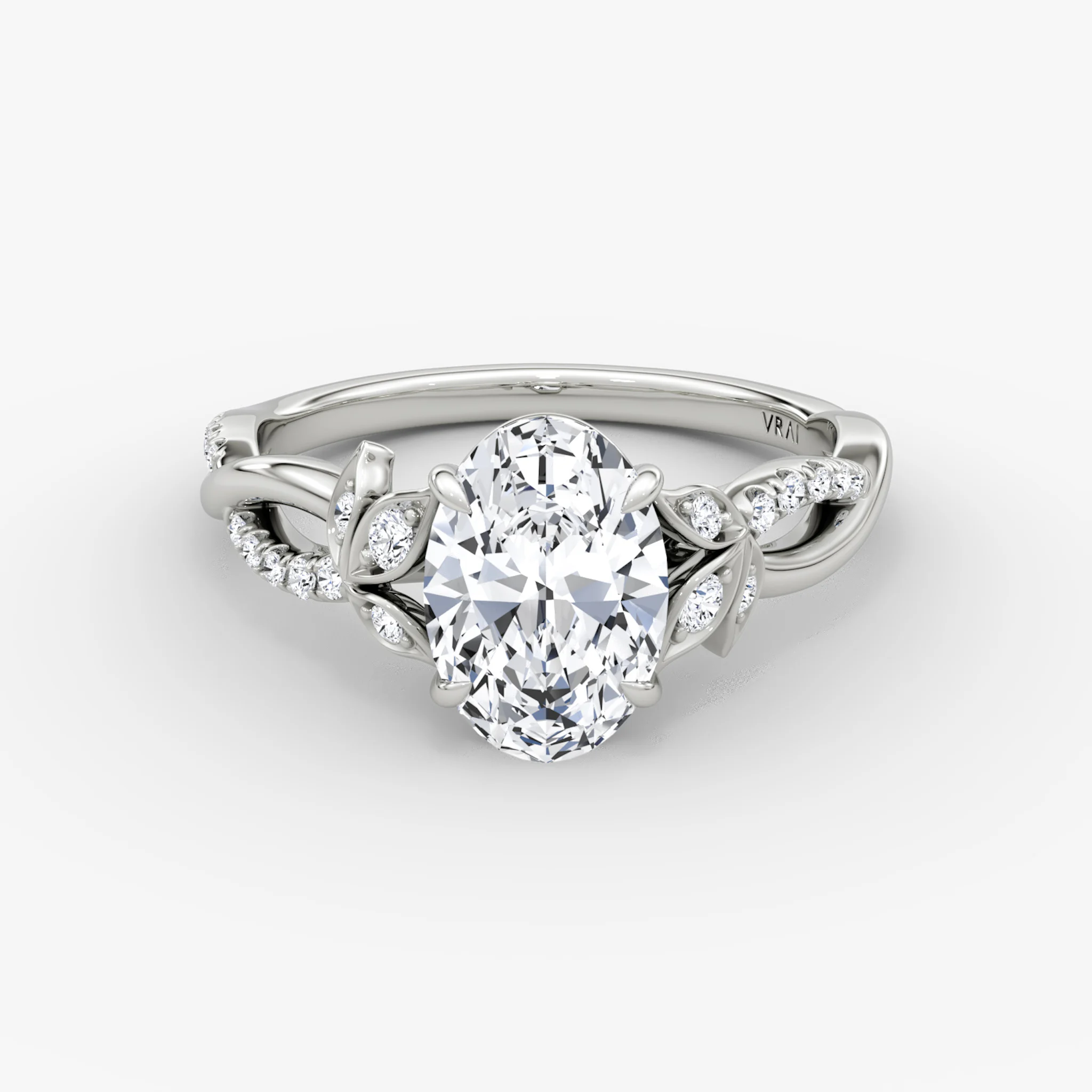 The Twisted Floral | Oval | Platinum | bandAccent: Pavé | diamondOrientation: vertical | caratWeight: other