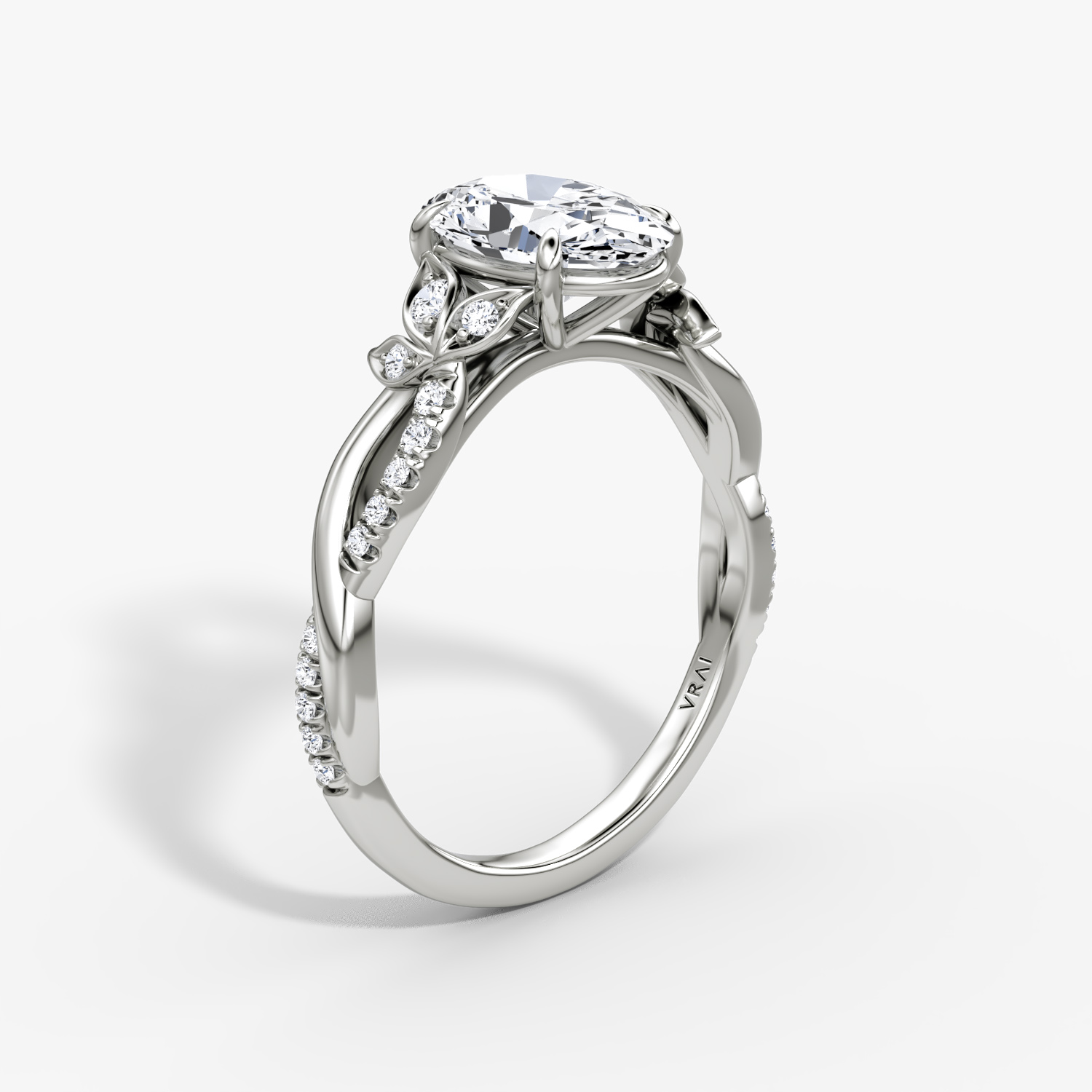 The Twisted Floral | Oval | Platinum | bandAccent: Pavé | diamondOrientation: vertical | caratWeight: other