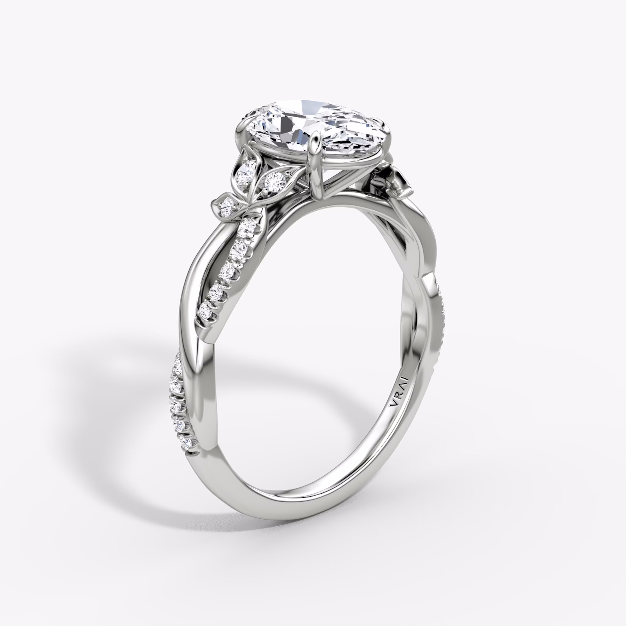 The Twisted Floral | Oval | Platinum | bandAccent: Pavé | diamondOrientation: vertical | caratWeight: other