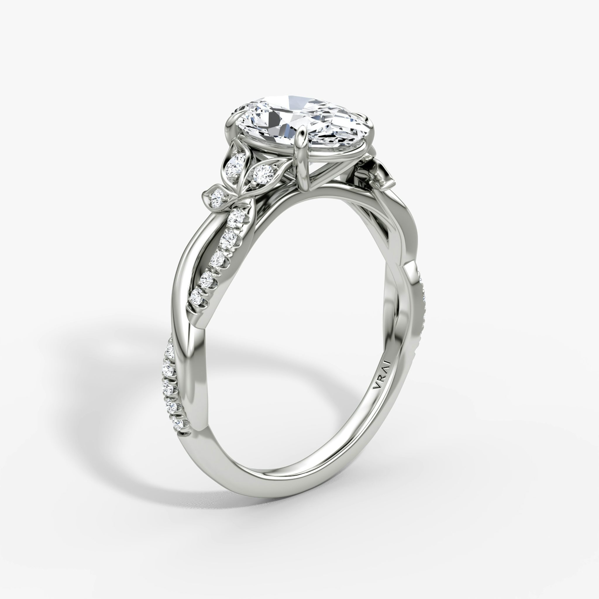 The Twisted Floral | Oval | Platinum | bandAccent: Pavé | diamondOrientation: vertical | caratWeight: other