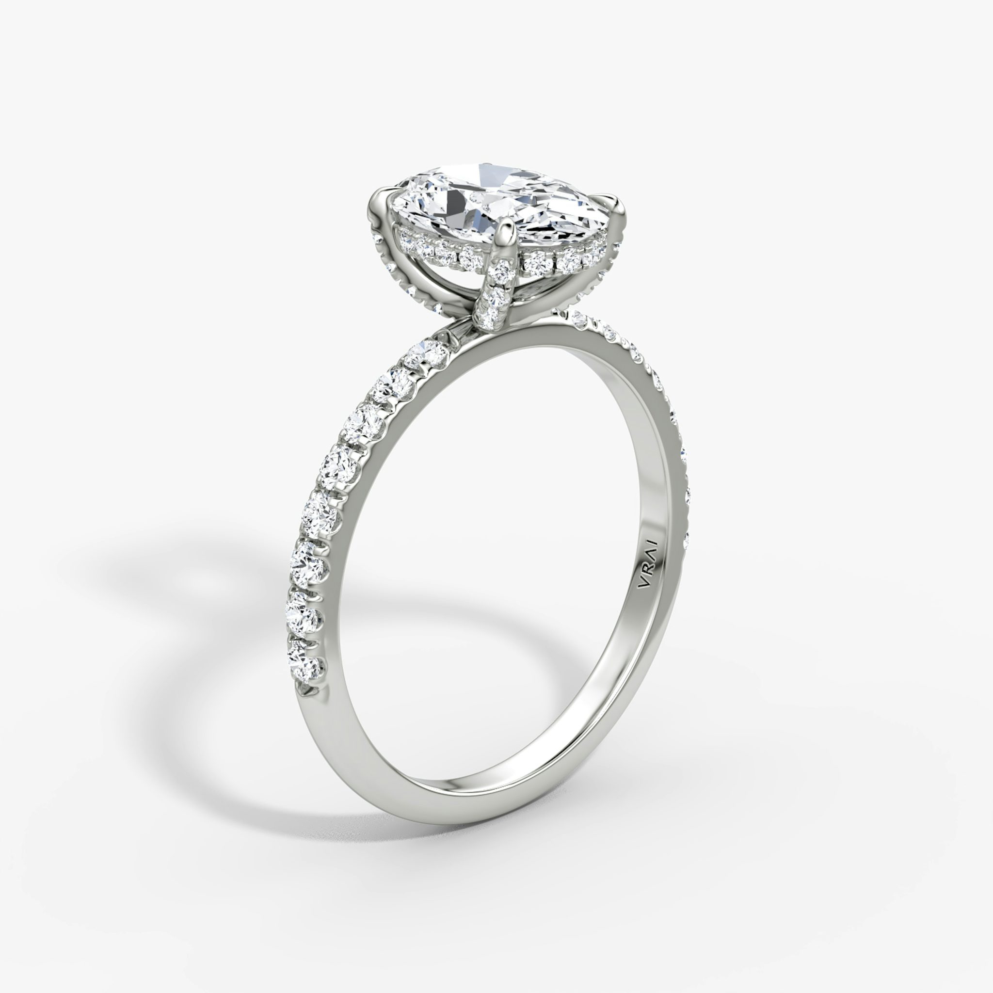 The Classic Hidden Halo | Oval | Platinum | bandAccent: Pavé | bandWidth: large | prongStyle: Pavé | diamondOrientation: vertical | caratWeight: other