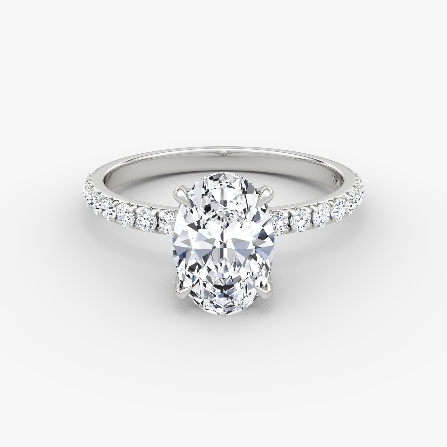 The Classic Hidden Halo | Oval | Platinum | bandAccent: Pavé | bandWidth: large | prongStyle: Pavé | diamondOrientation: vertical | caratWeight: other