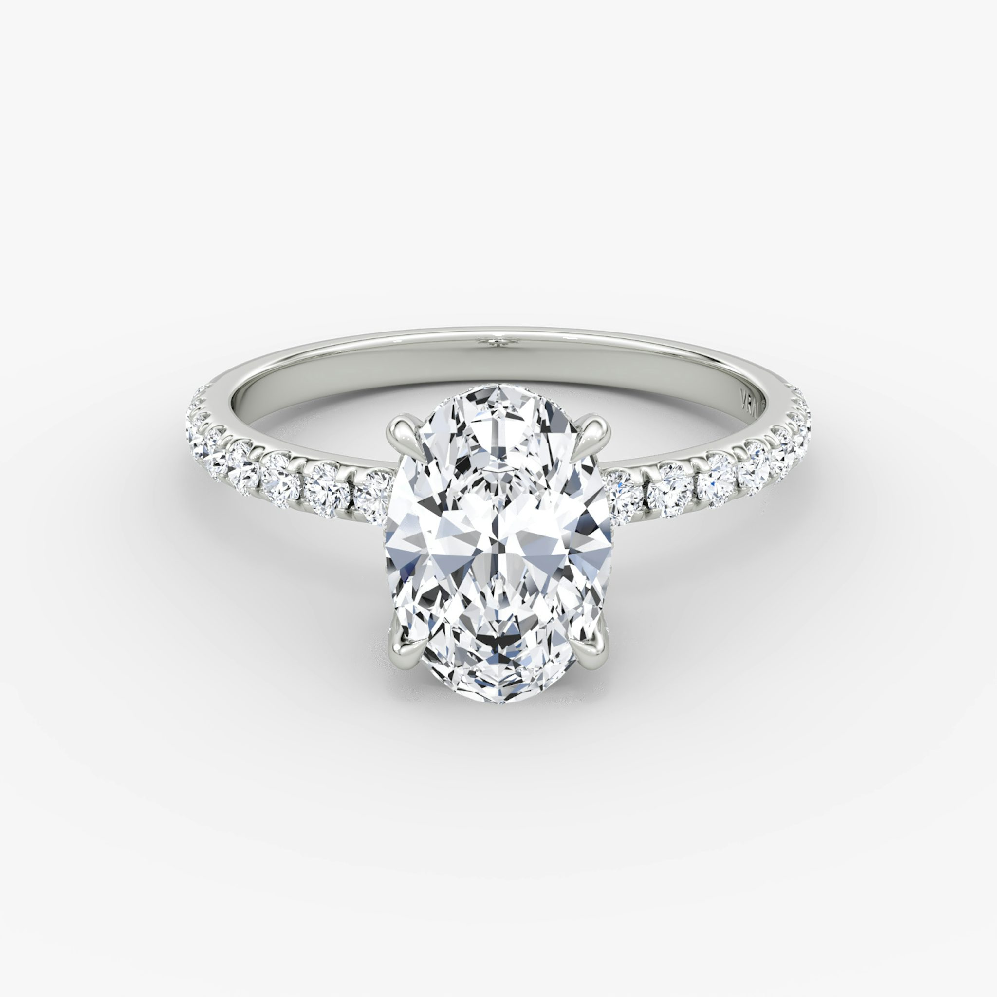 The Classic Hidden Halo | Oval | Platinum | bandAccent: Pavé | bandWidth: large | prongStyle: Pavé | diamondOrientation: vertical | caratWeight: other
