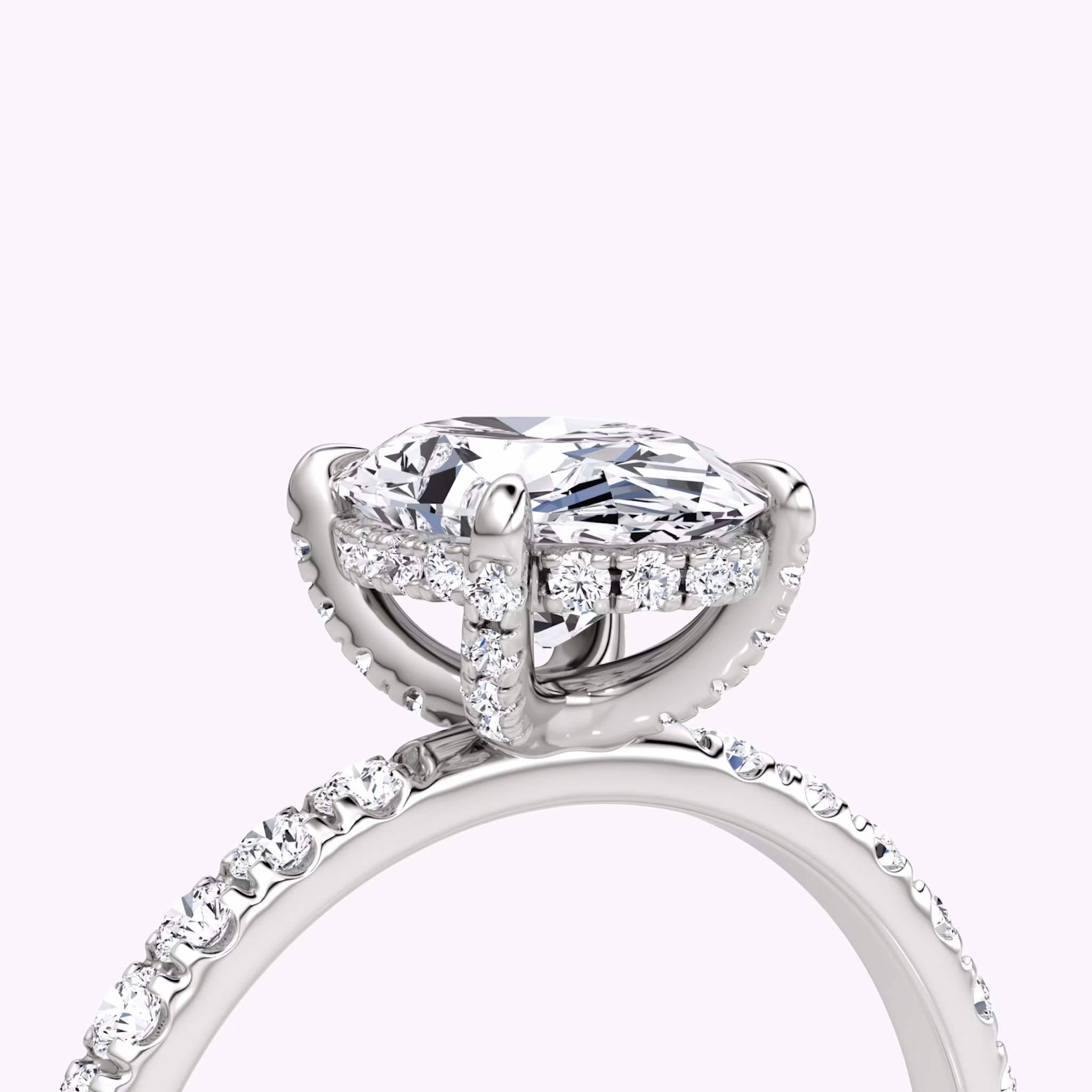 The Classic Hidden Halo | Oval | Platinum | bandAccent: Pavé | bandWidth: large | prongStyle: Pavé | diamondOrientation: vertical | caratWeight: other