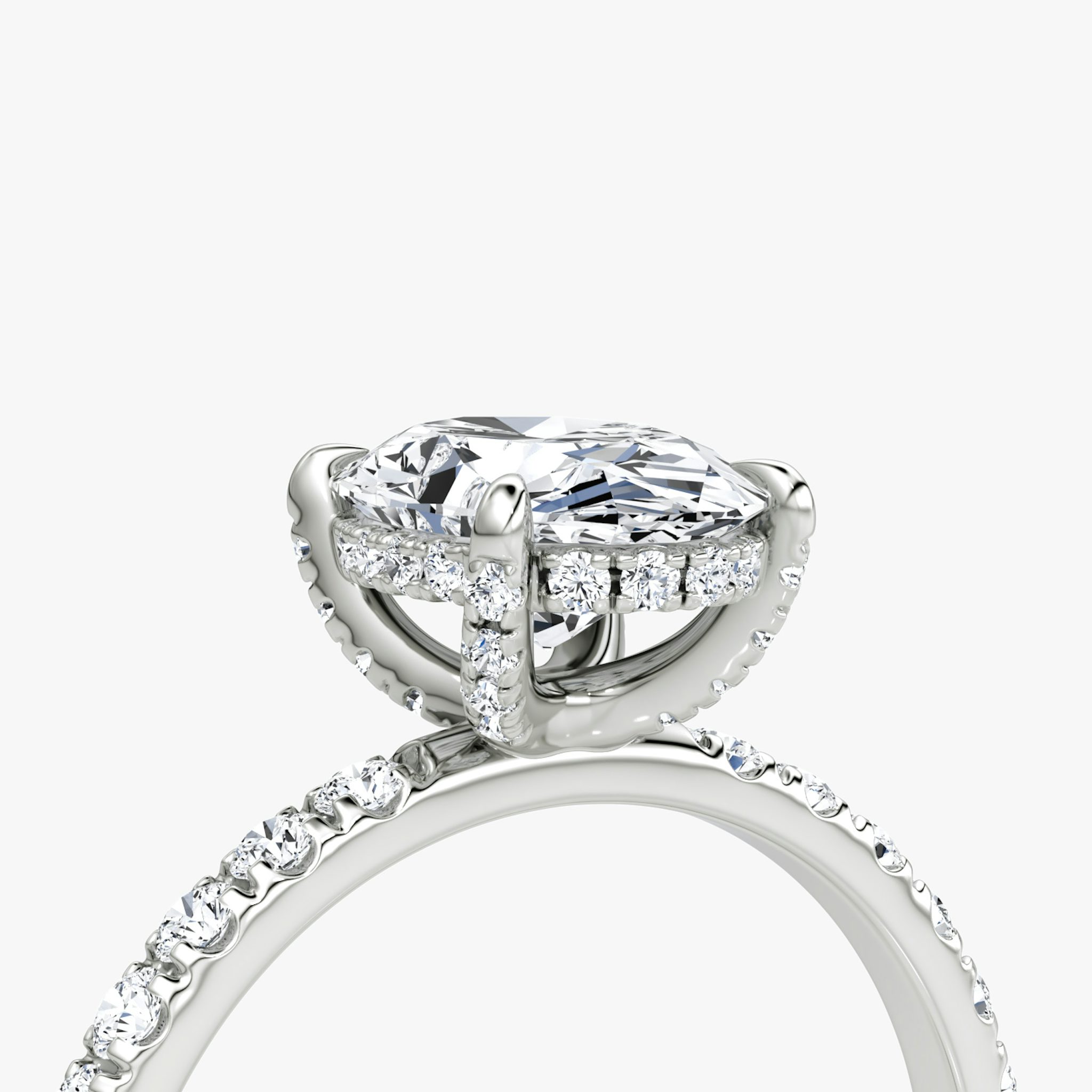 The Classic Hidden Halo | Oval | Platinum | bandAccent: Pavé | bandWidth: large | prongStyle: Pavé | diamondOrientation: vertical | caratWeight: other