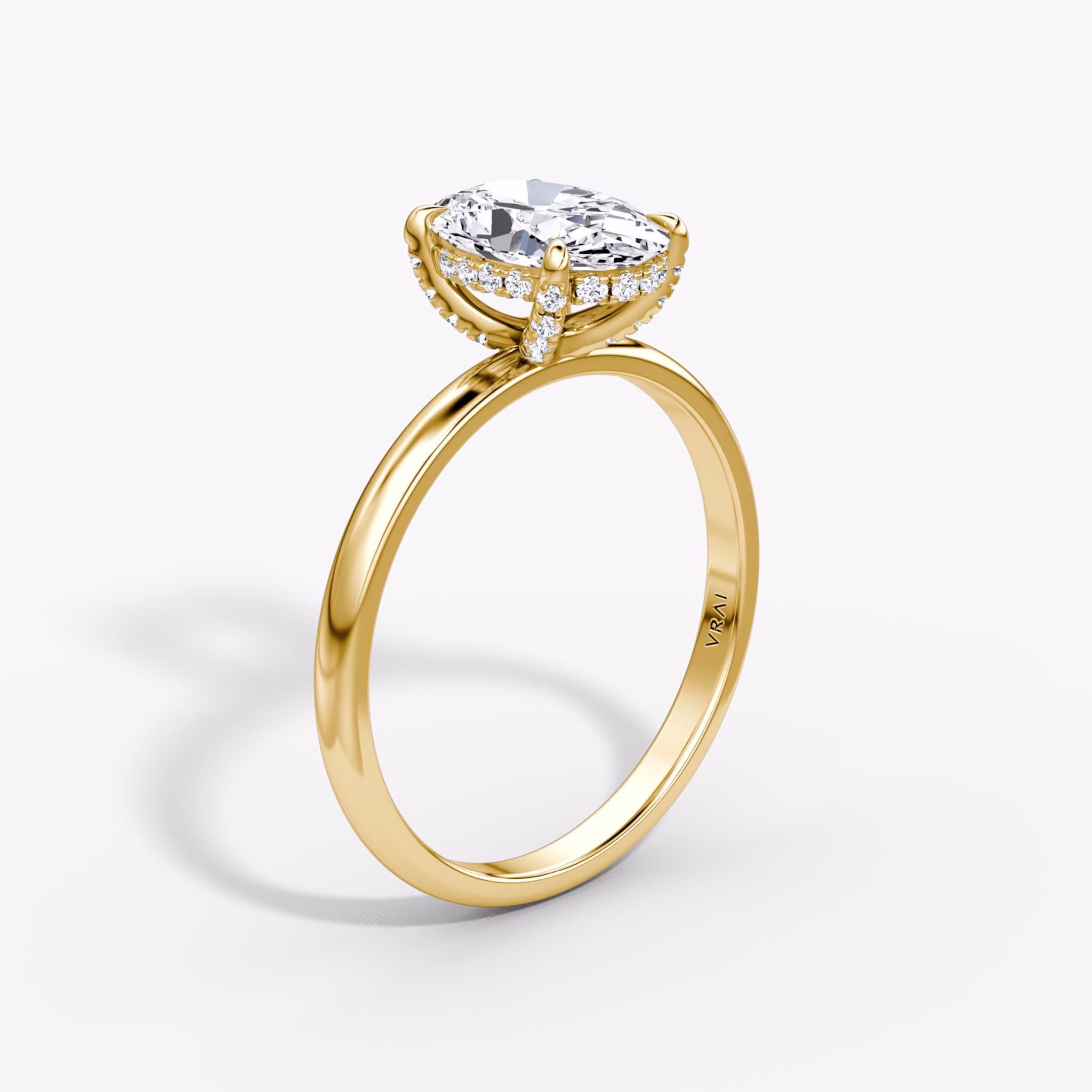 The Classic Hidden Halo | Oval | 18k | Yellow Gold | bandAccent: Plain | bandWidth: large | prongStyle: Pavé | diamondOrientation: vertical | caratWeight: other