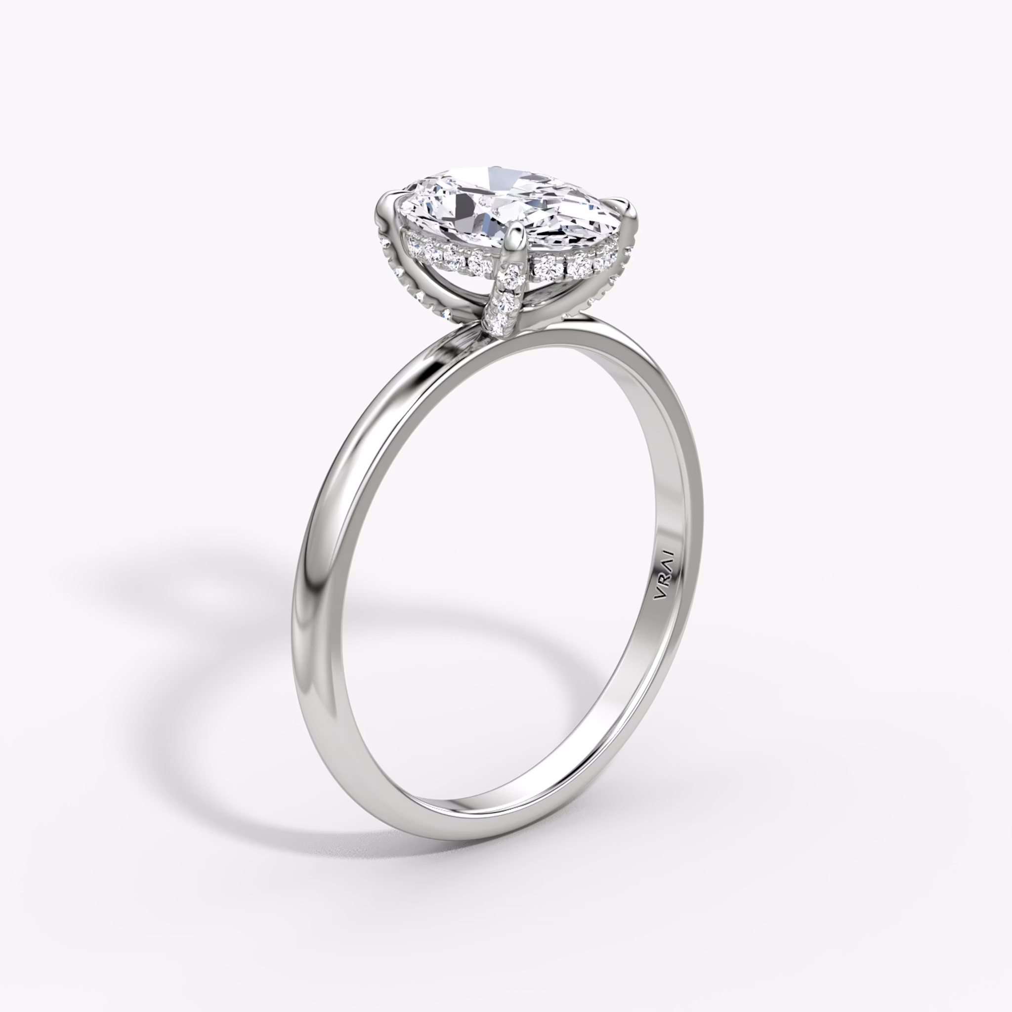 The Classic Hidden Halo | Oval | Platinum | bandAccent: Plain | bandWidth: large | prongStyle: Pavé | diamondOrientation: vertical | caratWeight: other