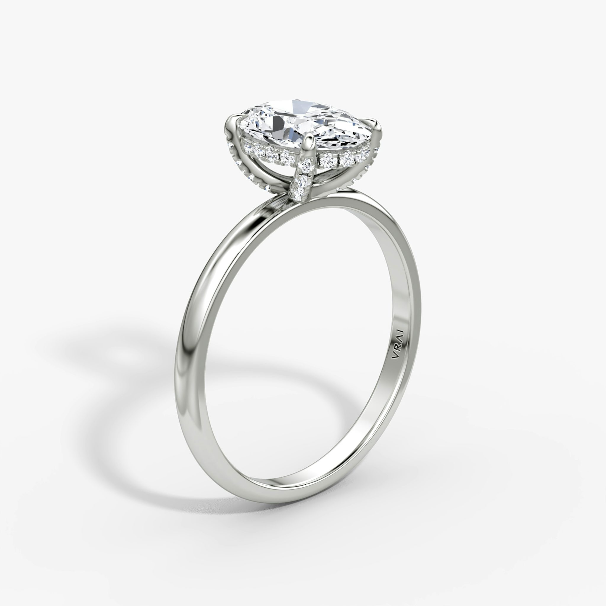 The Classic Hidden Halo | Oval | Platinum | bandAccent: Plain | bandWidth: large | prongStyle: Pavé | diamondOrientation: vertical | caratWeight: other
