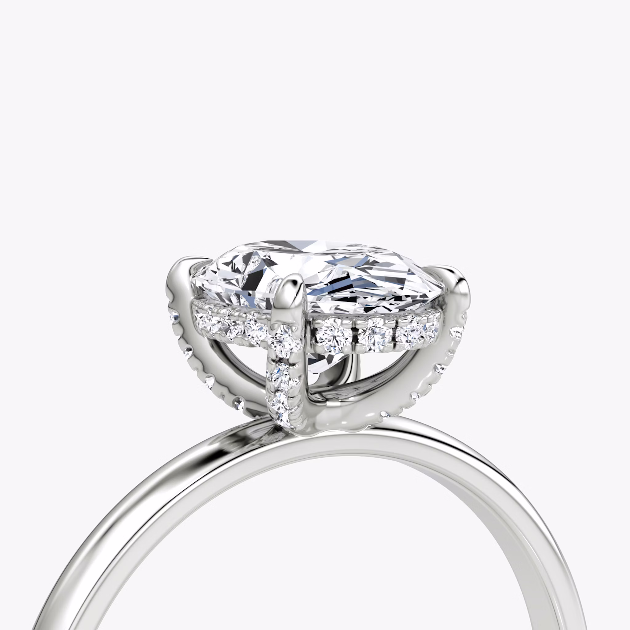 The Classic Hidden Halo | Oval | Platinum | bandAccent: Plain | bandWidth: large | prongStyle: Pavé | diamondOrientation: vertical | caratWeight: other