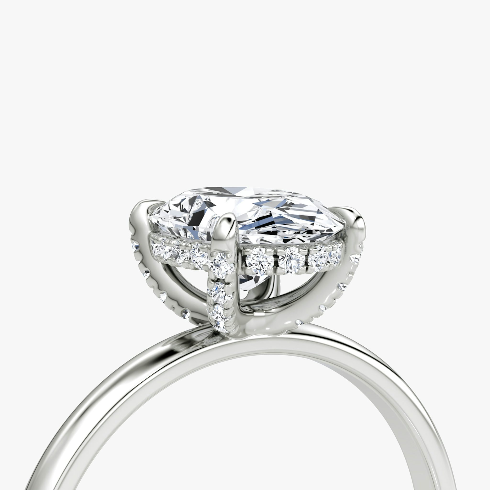 The Classic Hidden Halo | Oval | Platinum | bandAccent: Plain | bandWidth: large | prongStyle: Pavé | diamondOrientation: vertical | caratWeight: other