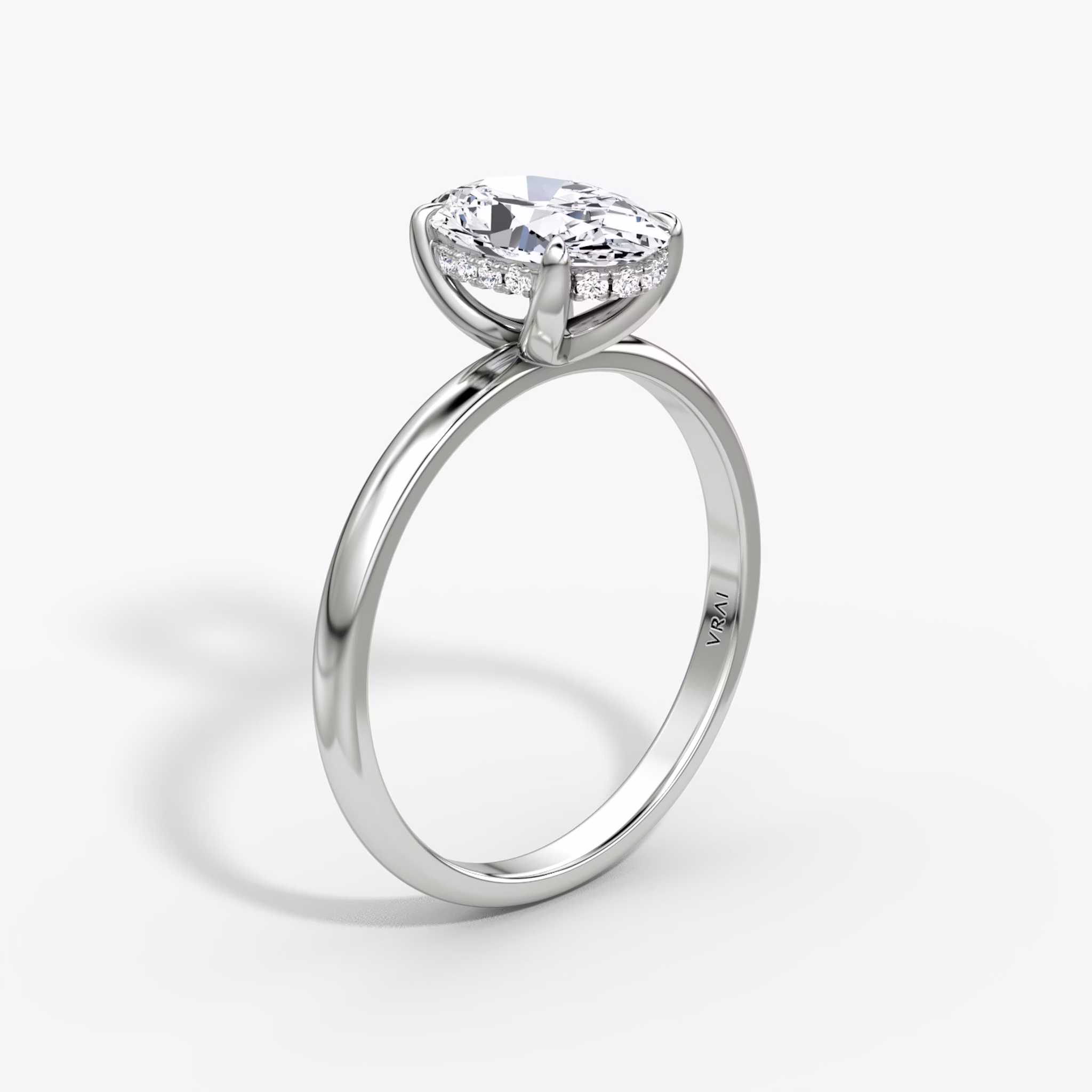 The Classic Hidden Halo | Oval | 18k | White Gold | bandAccent: Plain | bandWidth: large | prongStyle: Plain | diamondOrientation: vertical | caratWeight: other