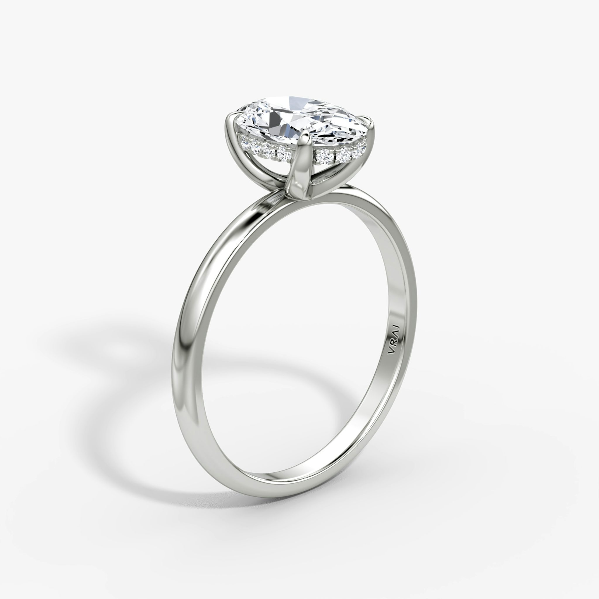 The Classic Hidden Halo | Oval | 18k | White Gold | bandAccent: Plain | bandWidth: large | prongStyle: Plain | diamondOrientation: vertical | caratWeight: other